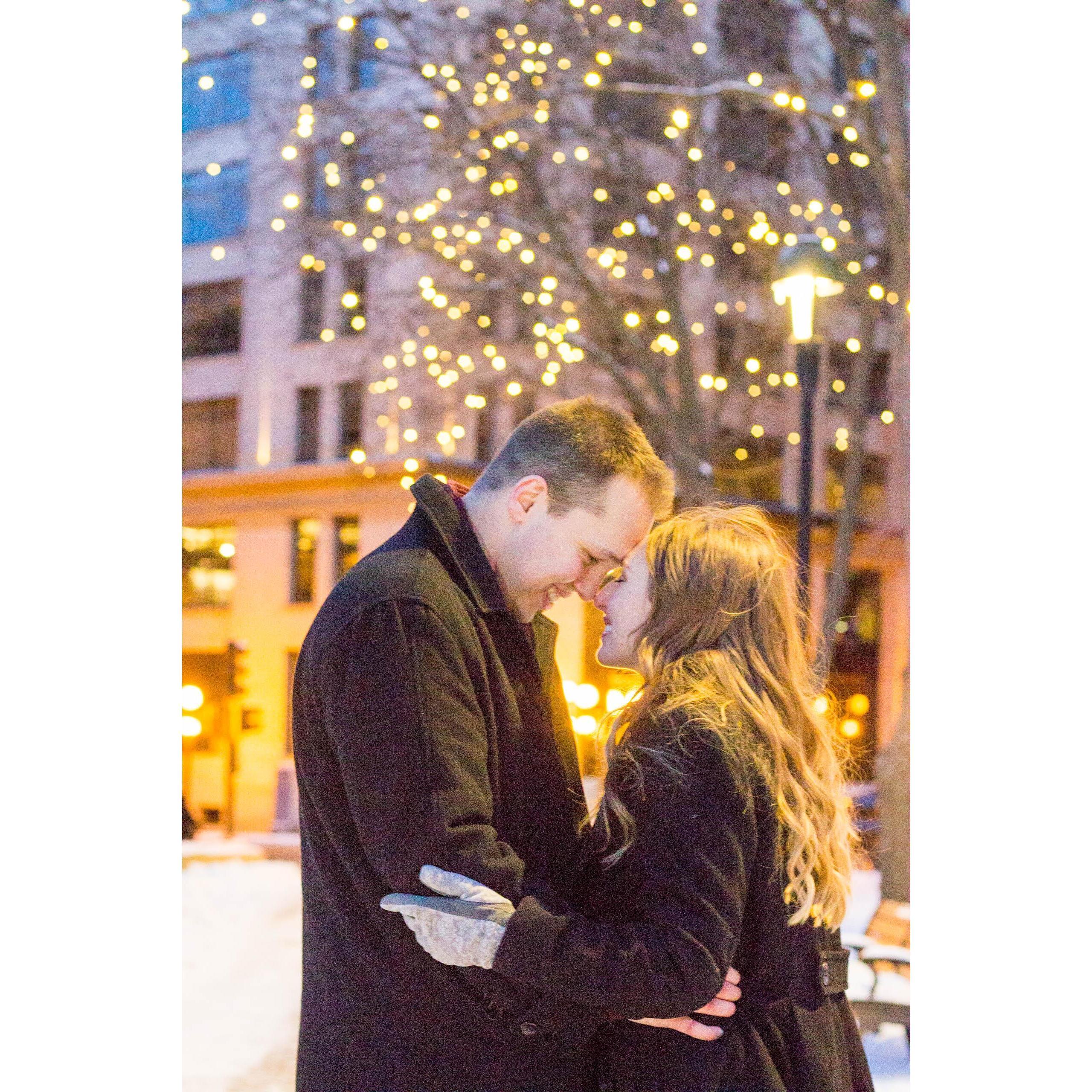 Posing for our 2019 engagement photos in Mears Park, near where we met outside my apartment seven years before.