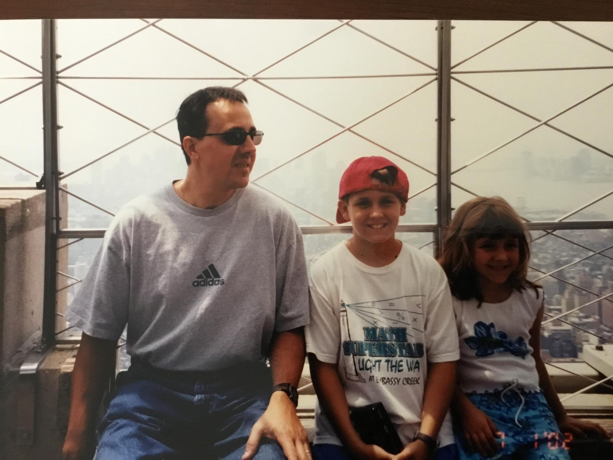 Michael with his sister and father