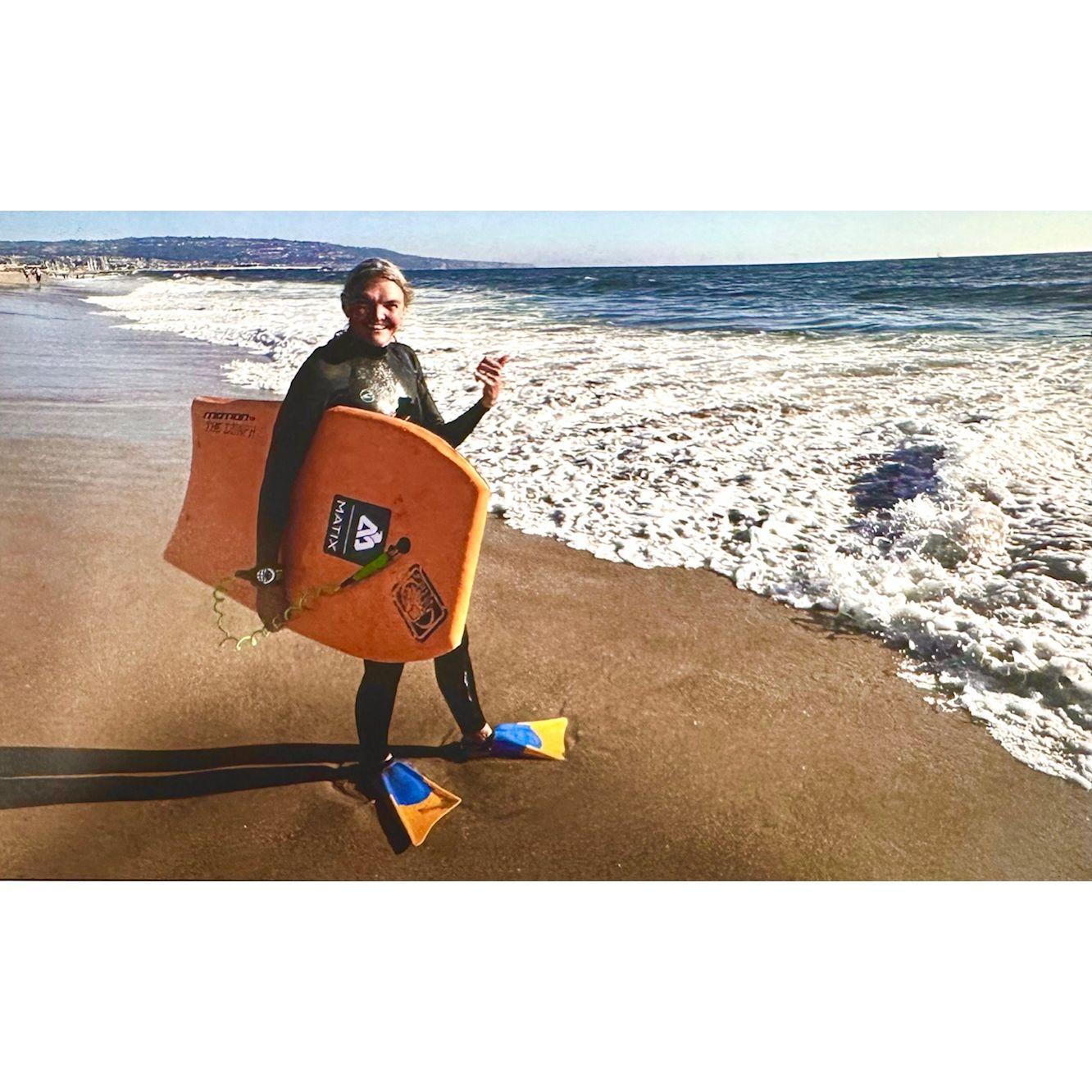 Sharon is legit. She does not just stay in the whitewash. She paddles all the way out, hunting waves.
Hermosa Beach with Palos Verdes Peninsula in the background.
