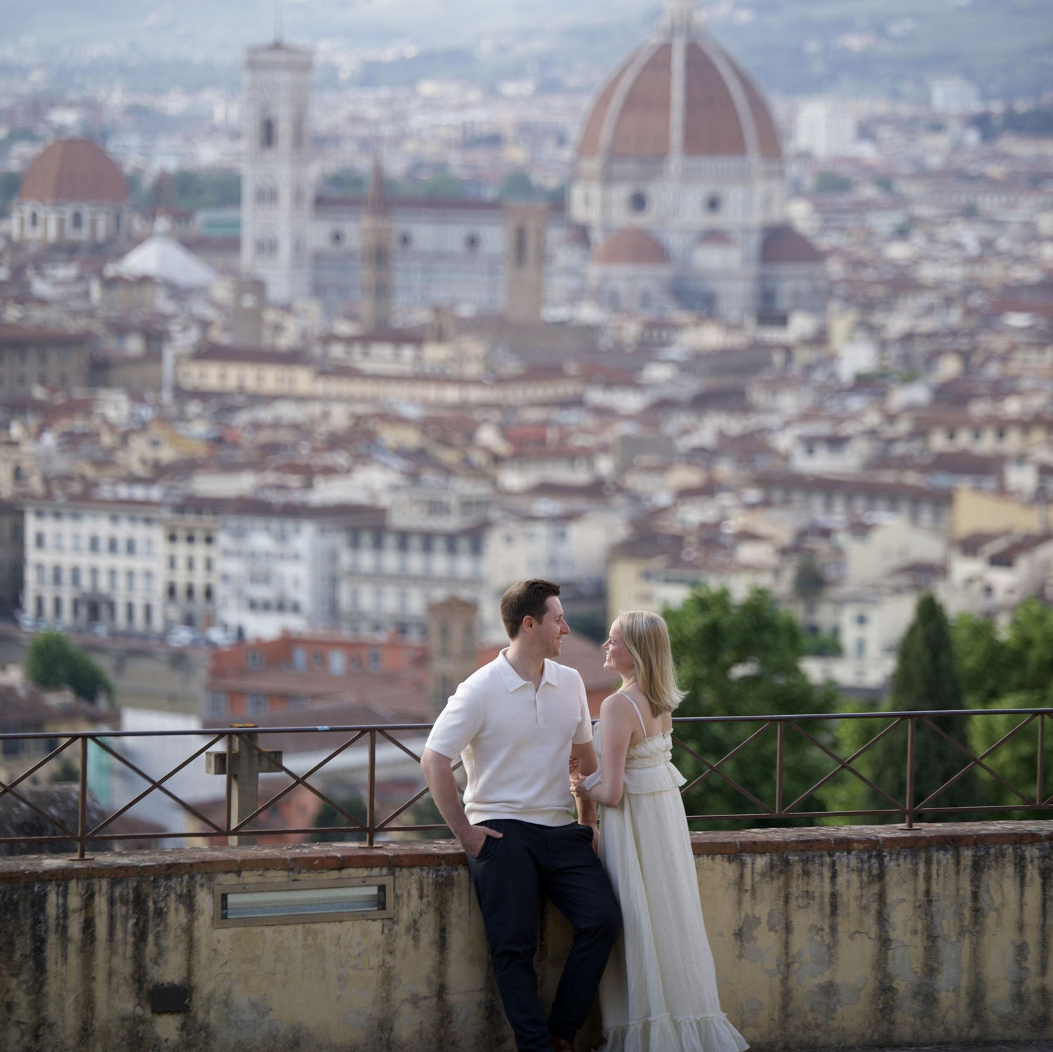 David arranged for a photographer to capture the proposal and beautiful Florence skyline.