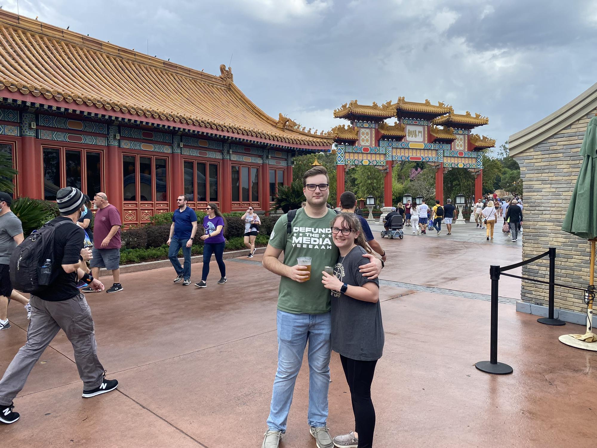 Jacob and Alianna visiting Epcot at Disney during a trip with their friend Josh in 2022.