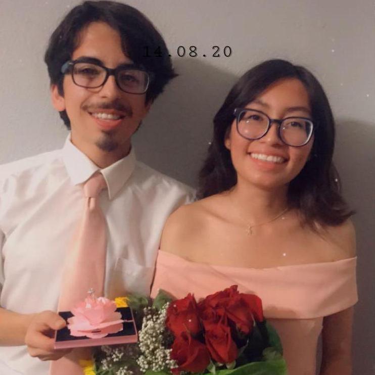 Moments after Jorge got permission from my parents to date me -- he gave me the biggest bouquet of sunflowers and roses, and a promise ring!