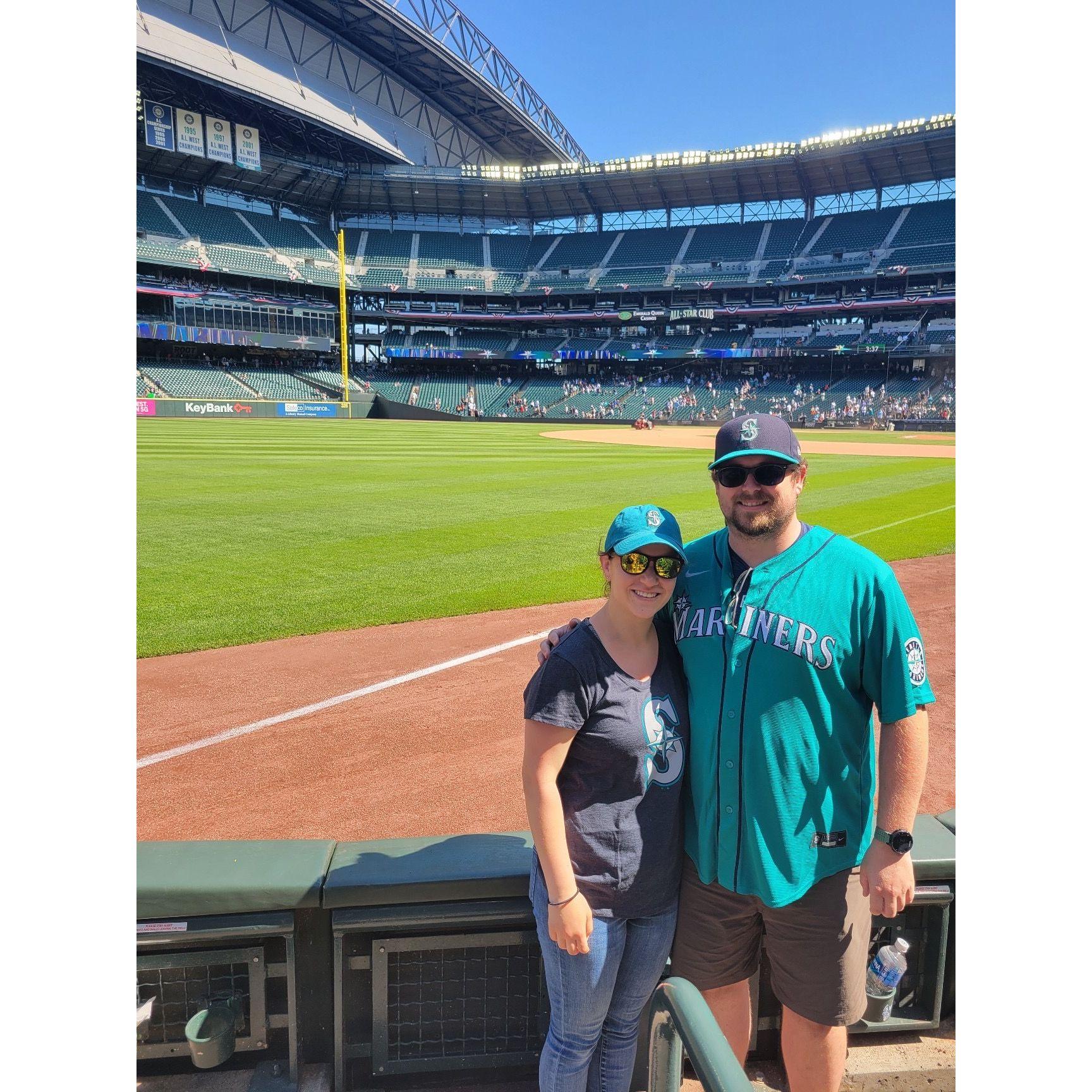 John turned Emilie into a baseball fan. Go Mariners!