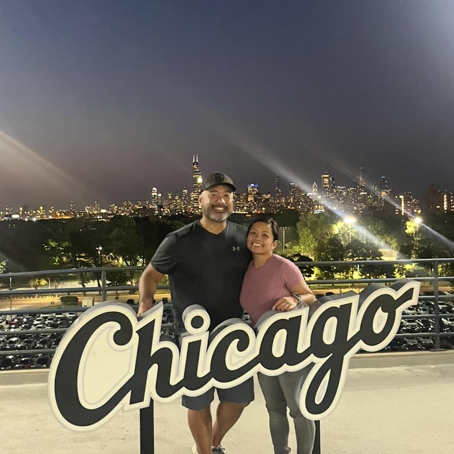 At our first baseball game together. Unfortunately it was a Sox game but we were rooting for the Yankees. The skyline view from the south side though.