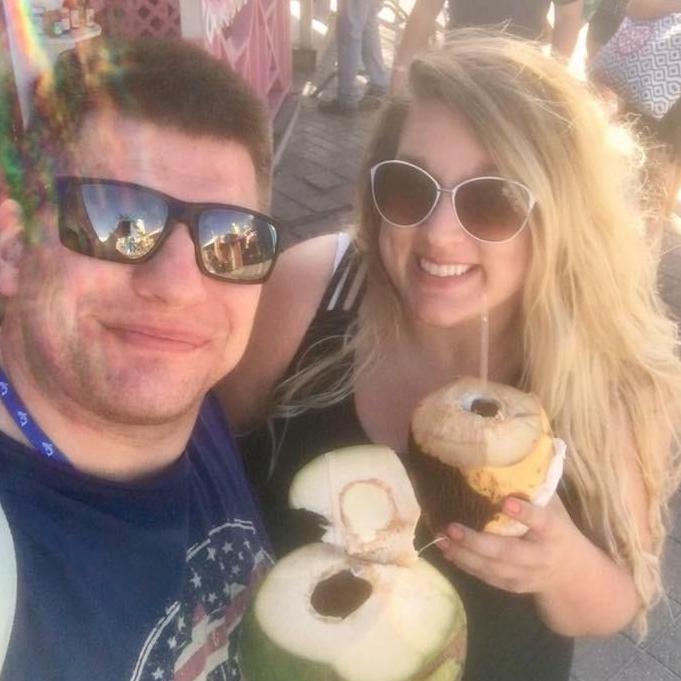Enjoying fresh coconut water in the Bahamas