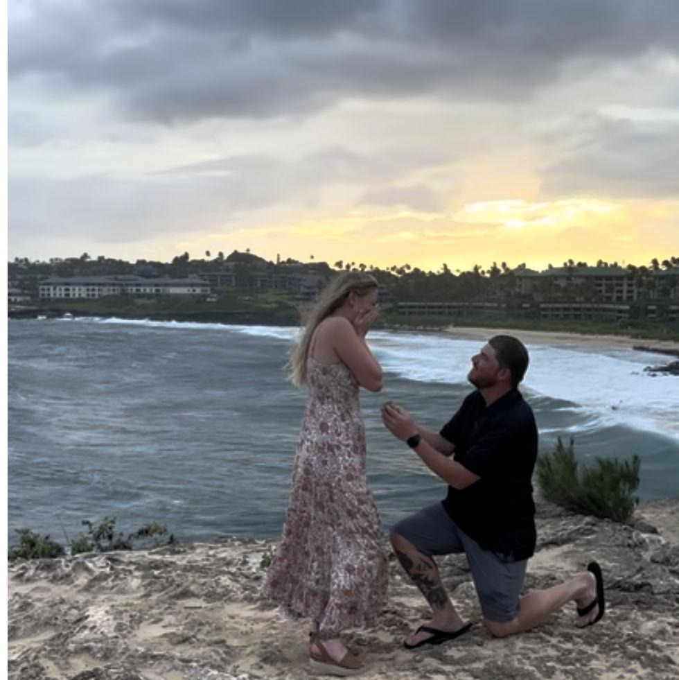 Austin's beautiful proposal at Shipwreck beach in Poipu, Kauai