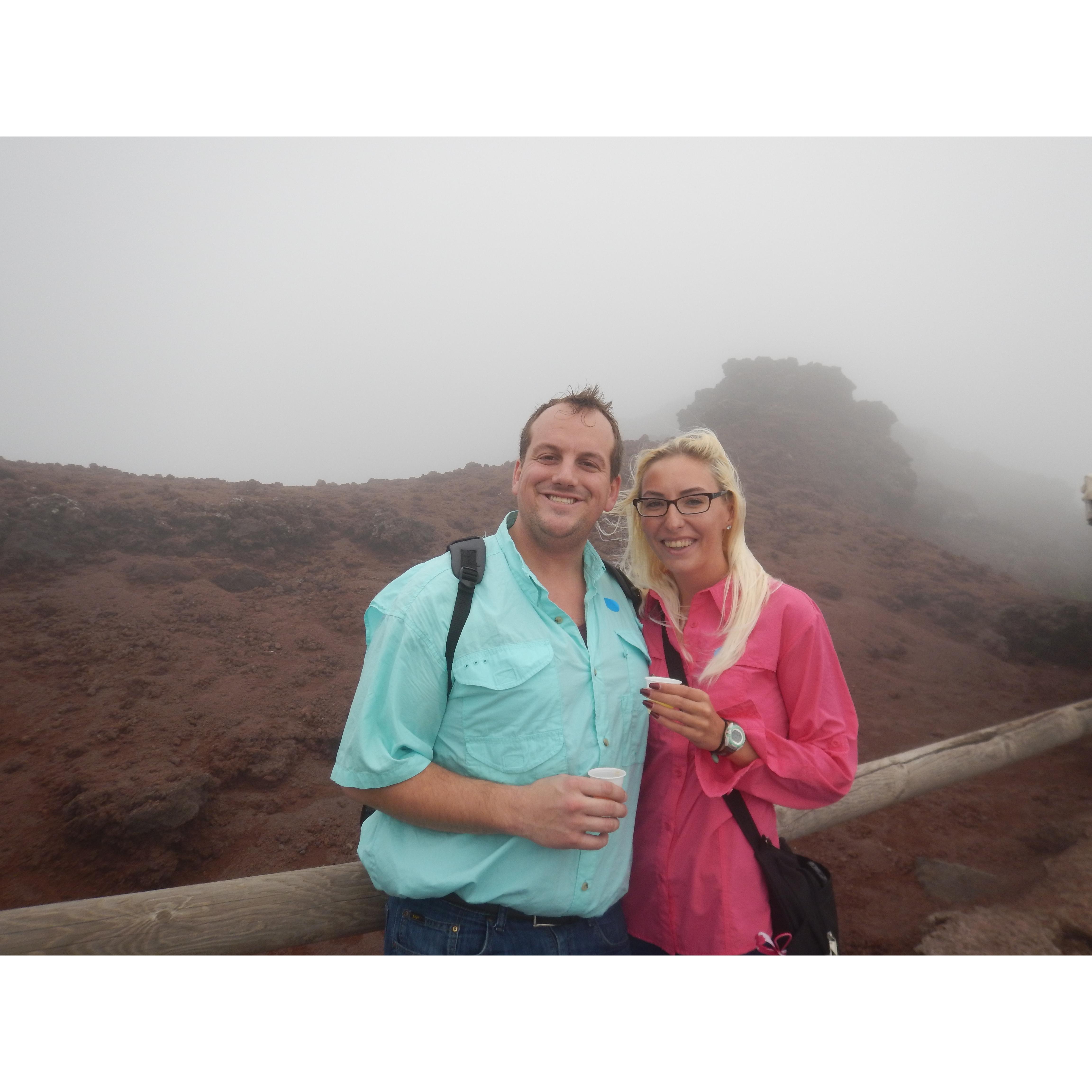 Celebrating climbing to the top of Mount Vesuvius with some limoncello.