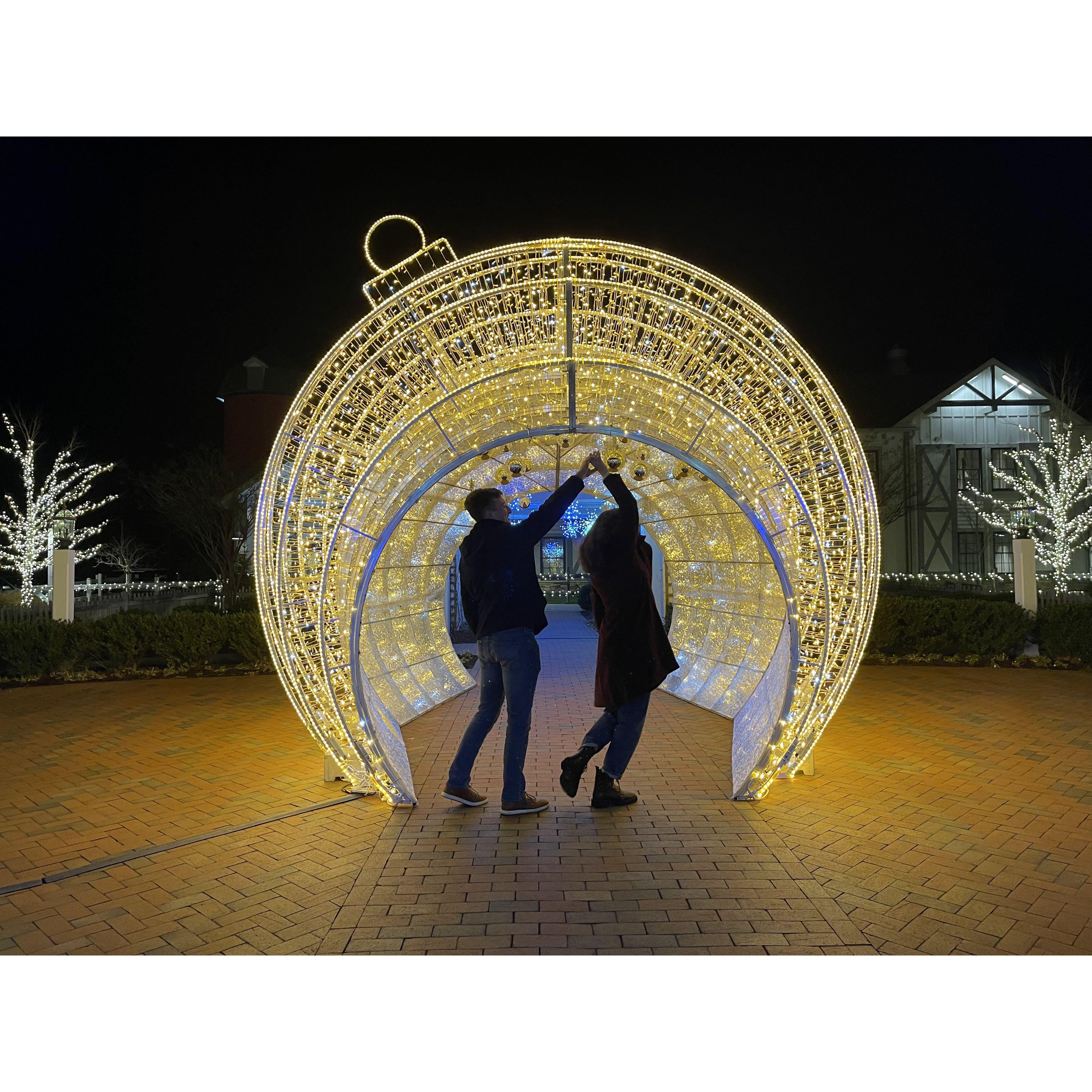 The first time at our venue, enjoying all of the incredible lights and of course we have to get a dance in!