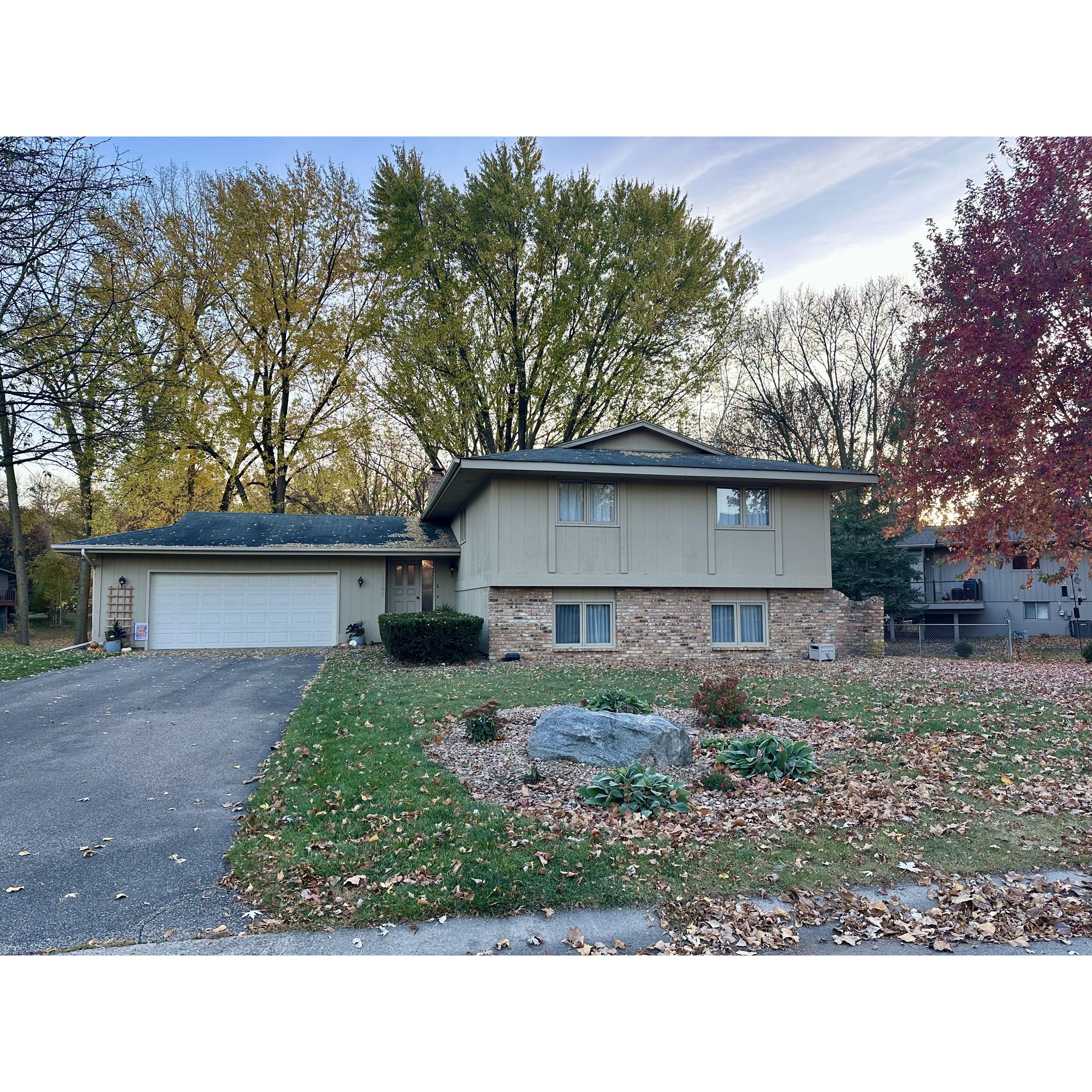 Our home showing off pretty Fall leaves.