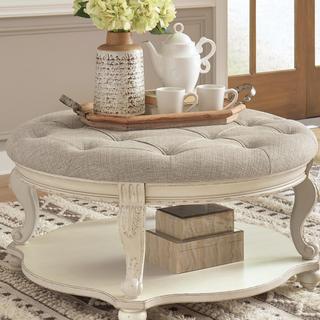 Realyn Ottoman Cocktail Table