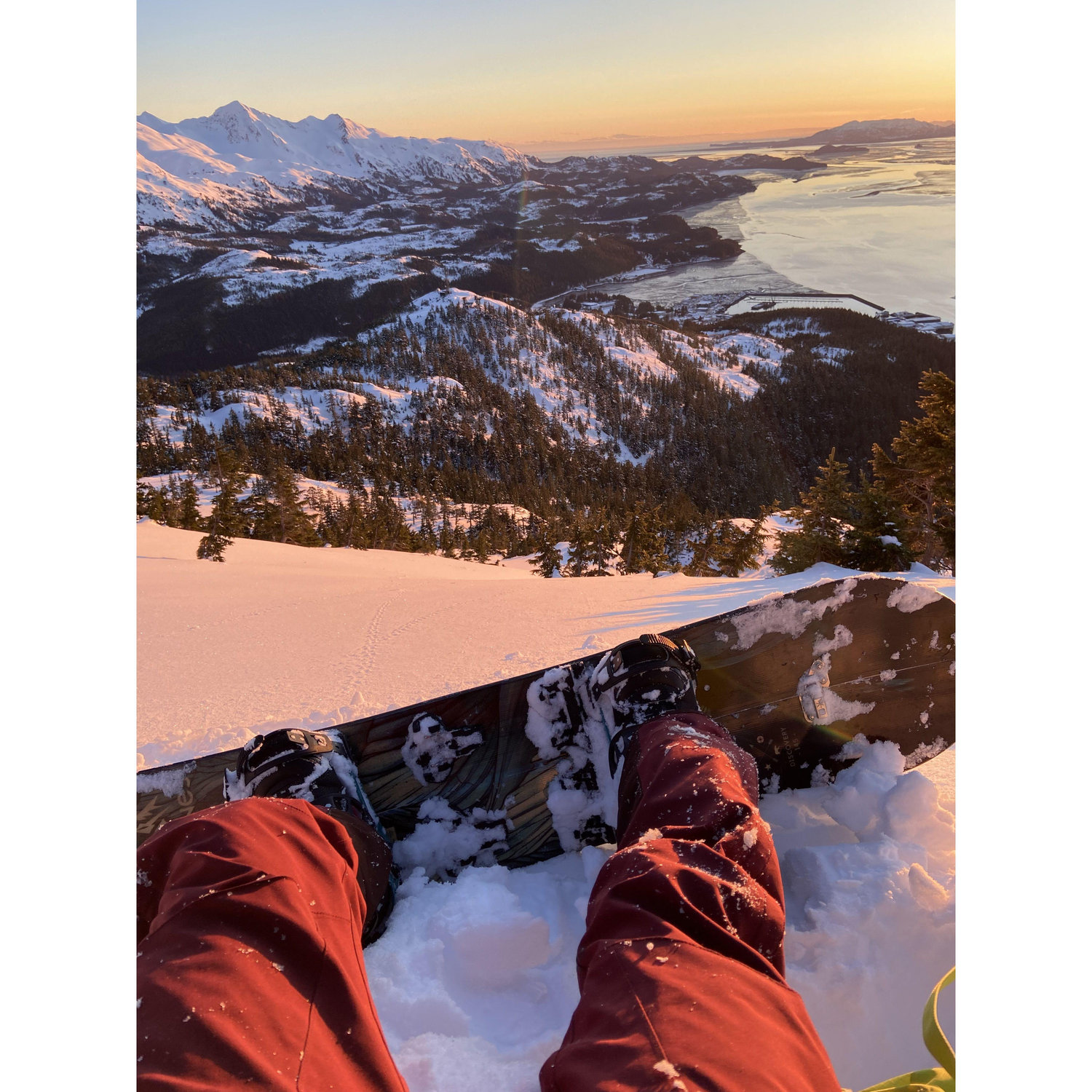 Noelle taking in the sunset between turns down Mt Eyak