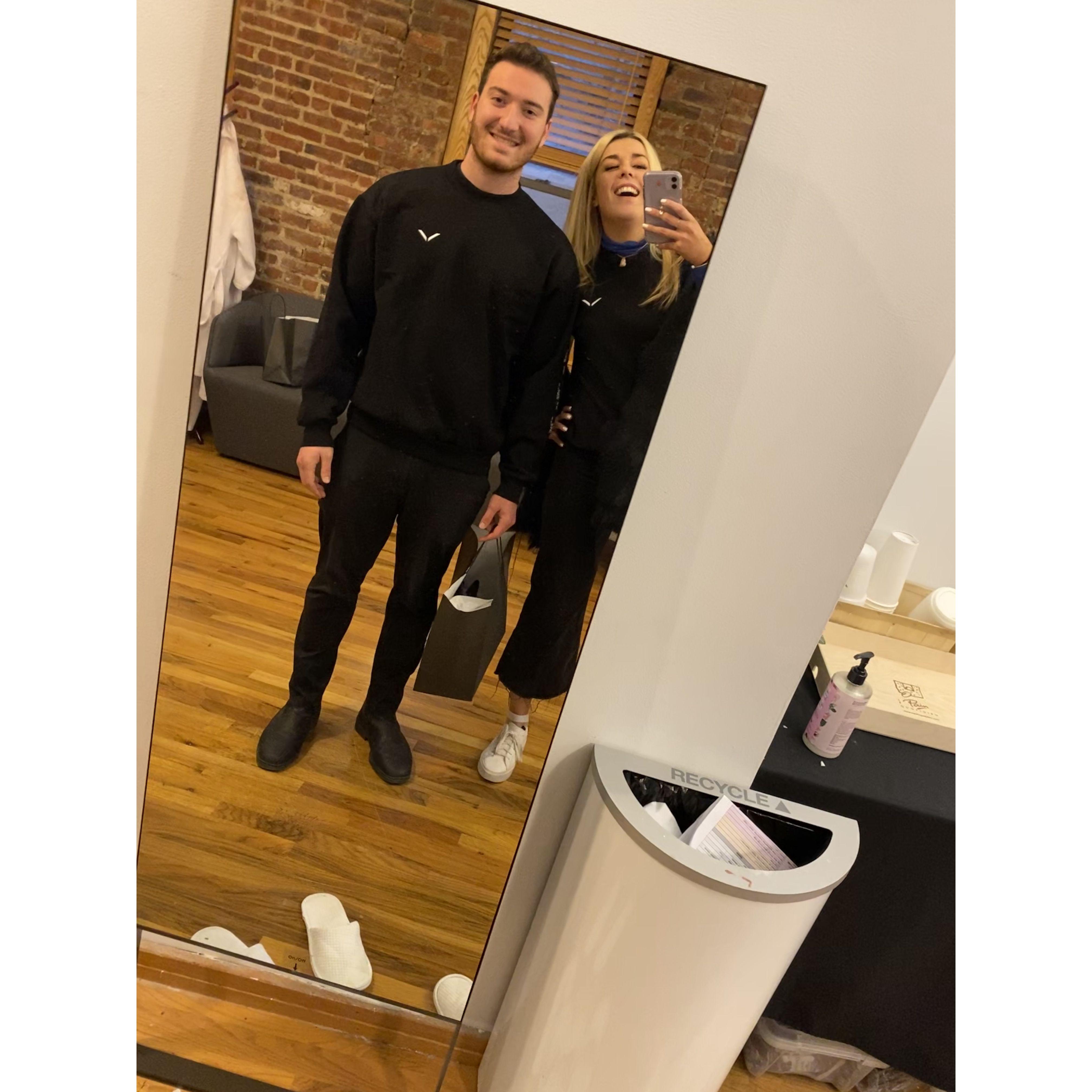 The earliest photo I can find of us together. This was famously the "day the world shut down" - Friday, March 13, 2020. We just got new swag at work and we were excited.
