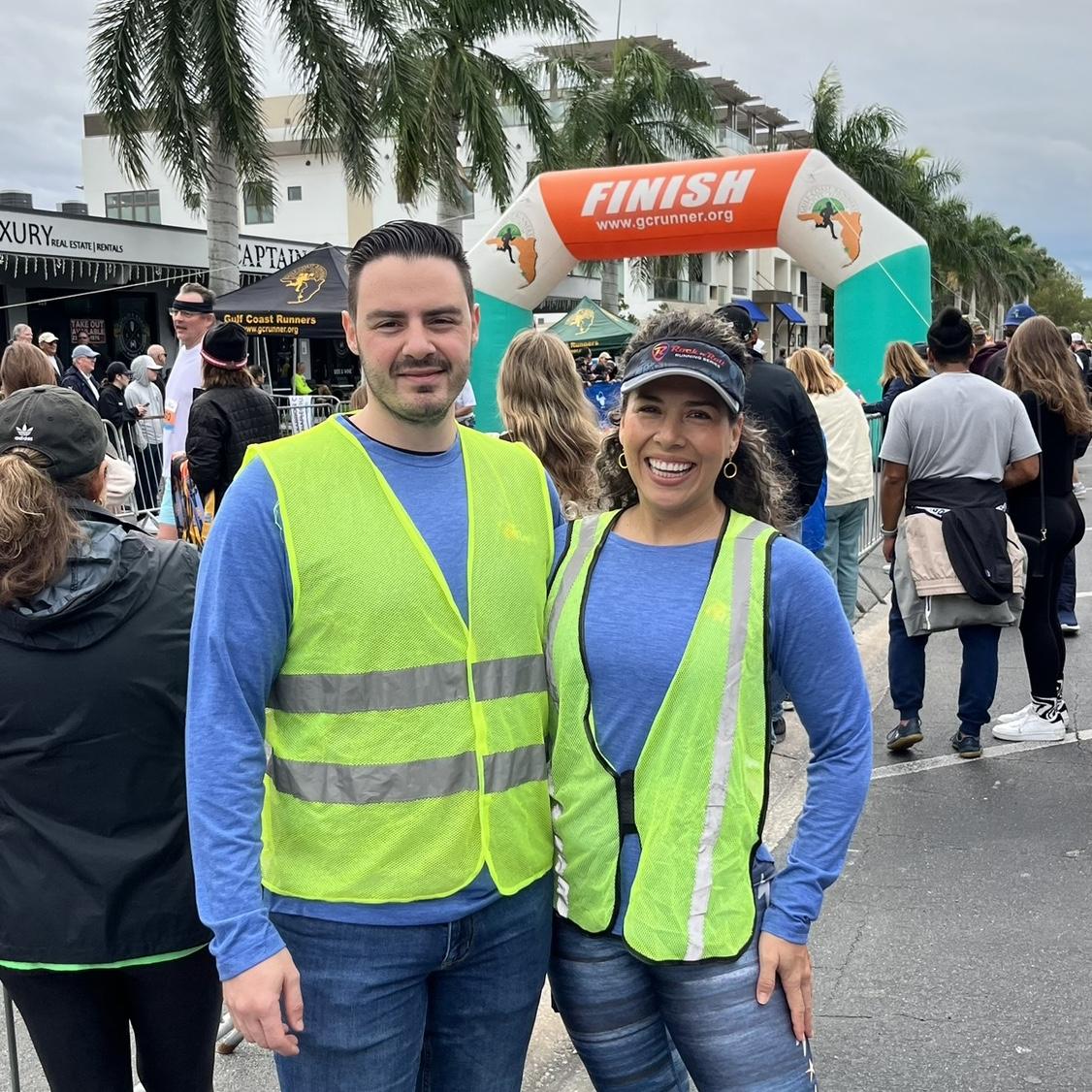 we enjoy giving back to our community, Naples Half Marathon Volunteers 2024
