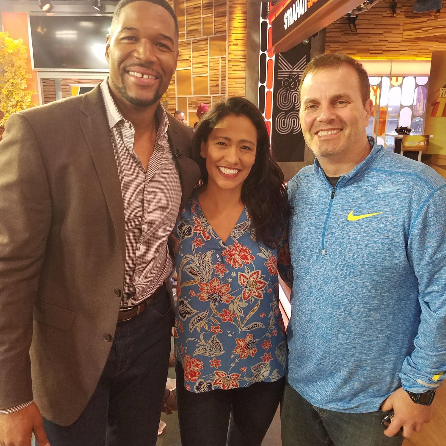 Giving tackling technique advice to Michael Strahan.