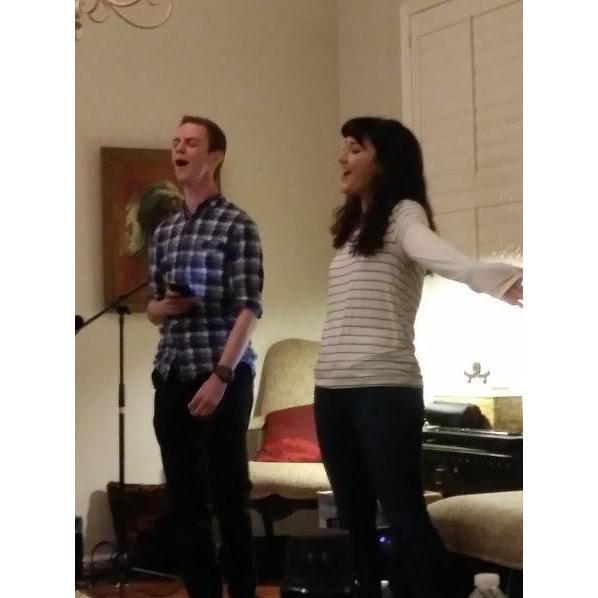 Singing together at music night 5 months before we started dating
