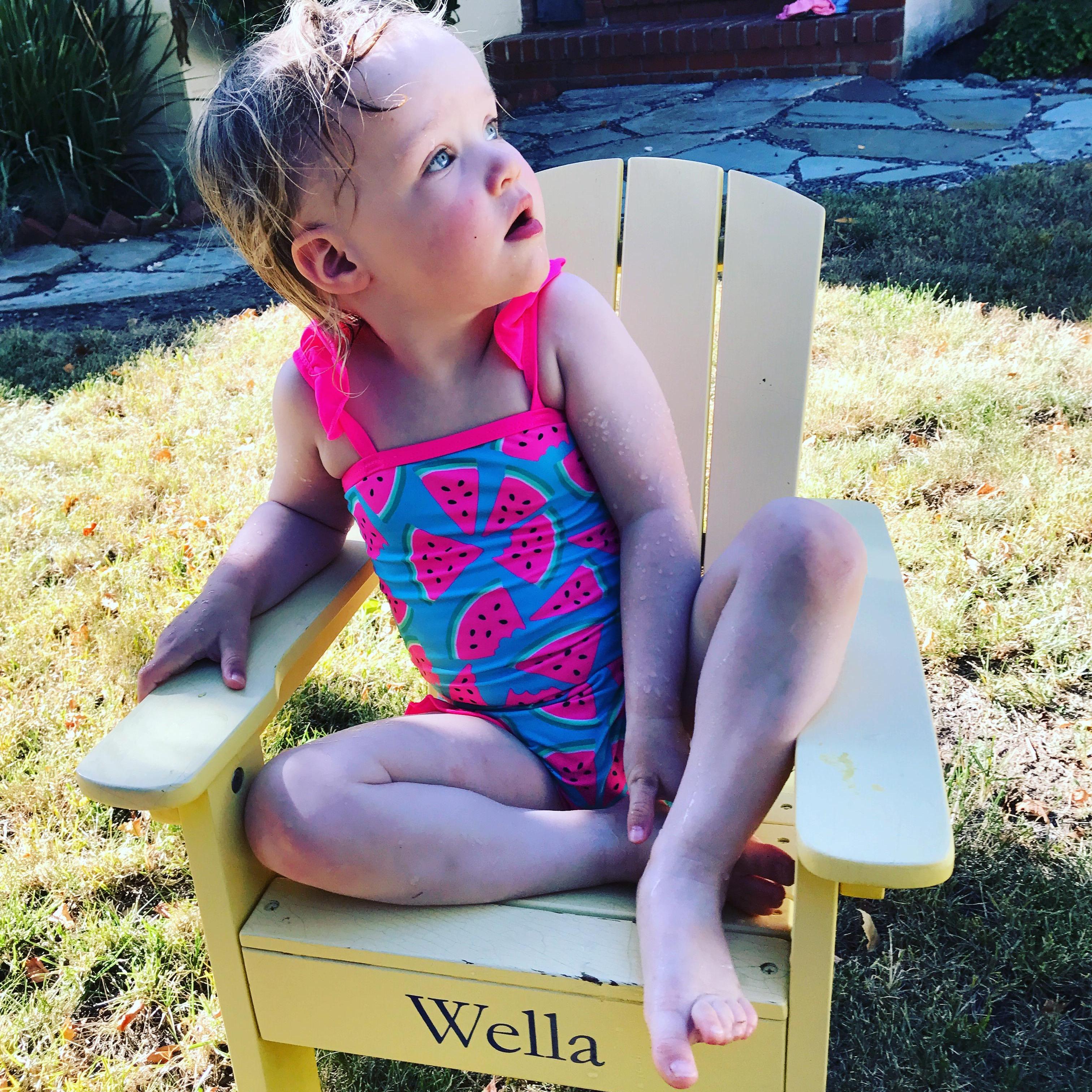 Wella lounging by her pool at our home in Mill Valley