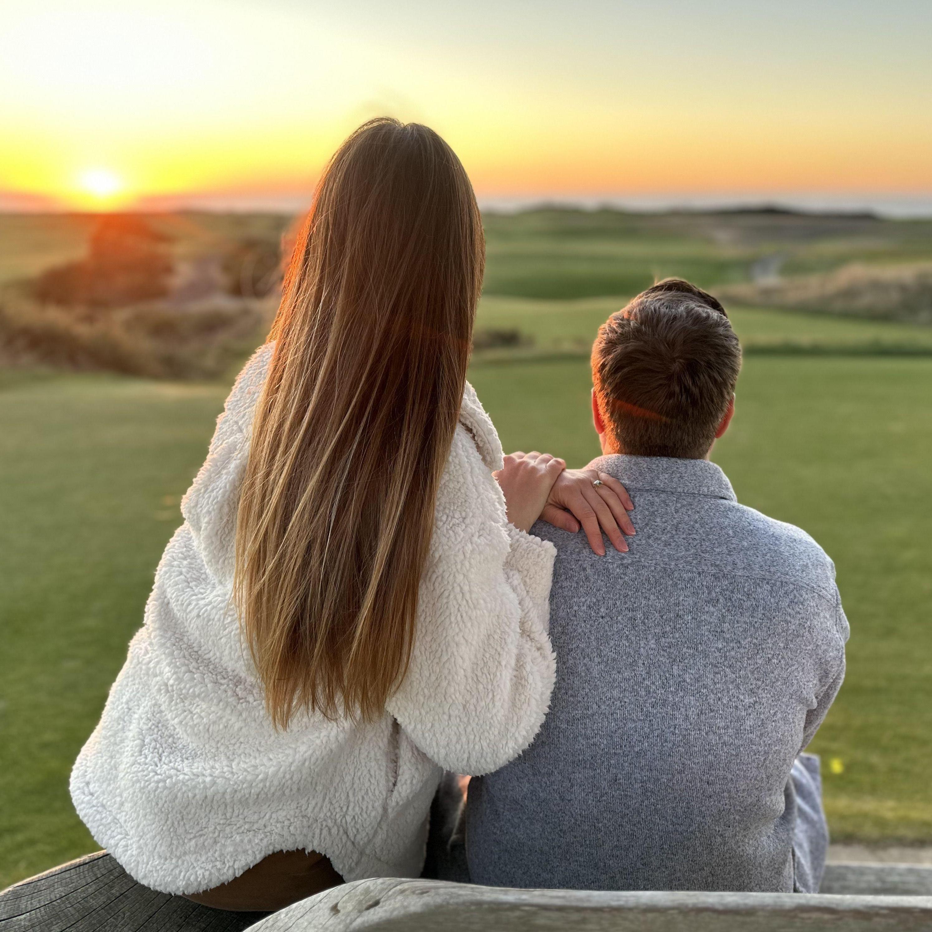 November 2023. Watching the sunset at Bandon Dunes. Professionally posed by Riley.