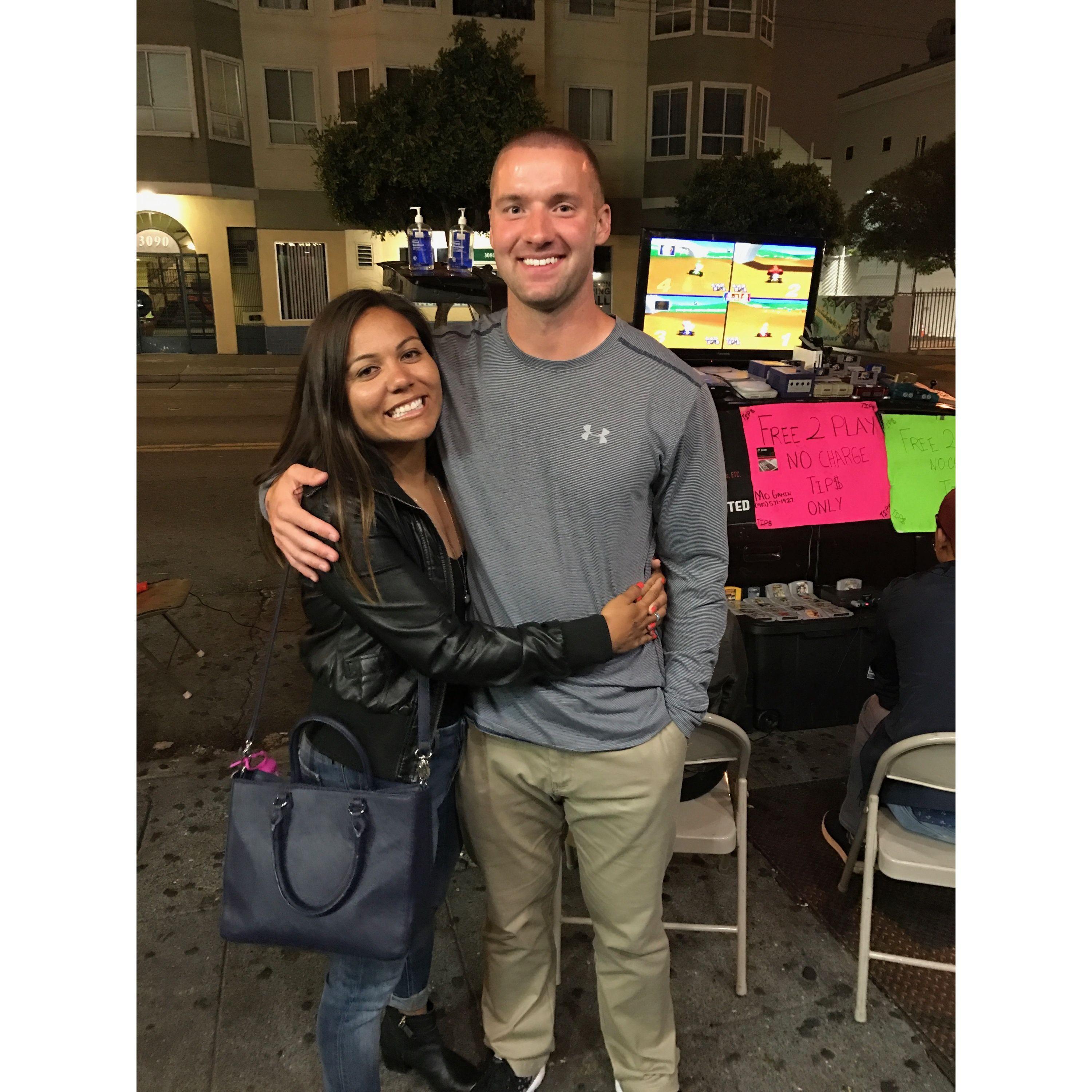 Our first travel trip together to San Francisco. Thad had to stop and take a picture in front of the playstation set up behind us.