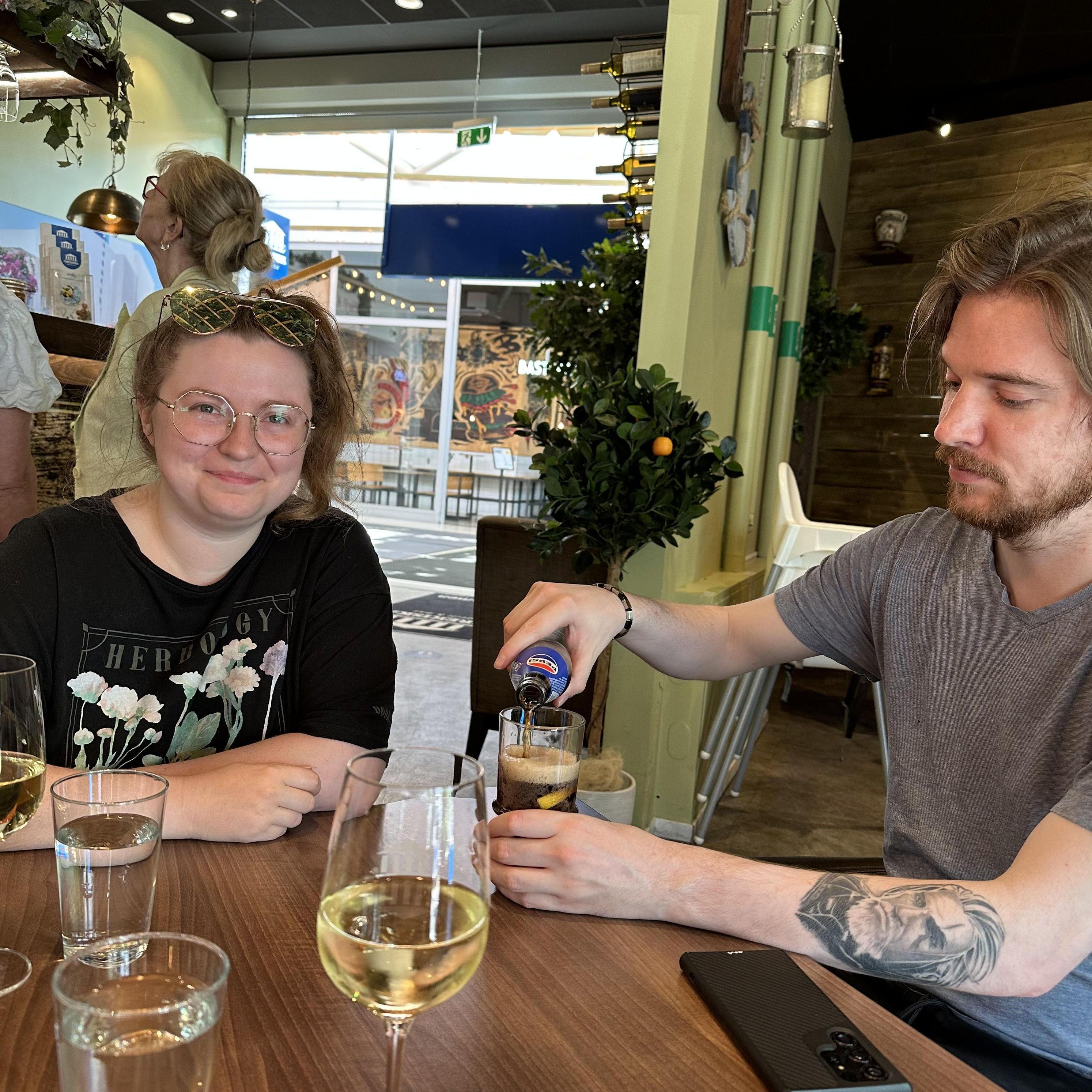 Enjoying some food and drinks during our trip to Sweden