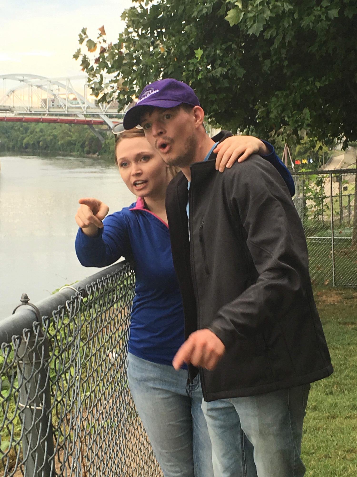 Tegan showing Dallen a giant water rat on the Mississippi. Nashville, August 2016.