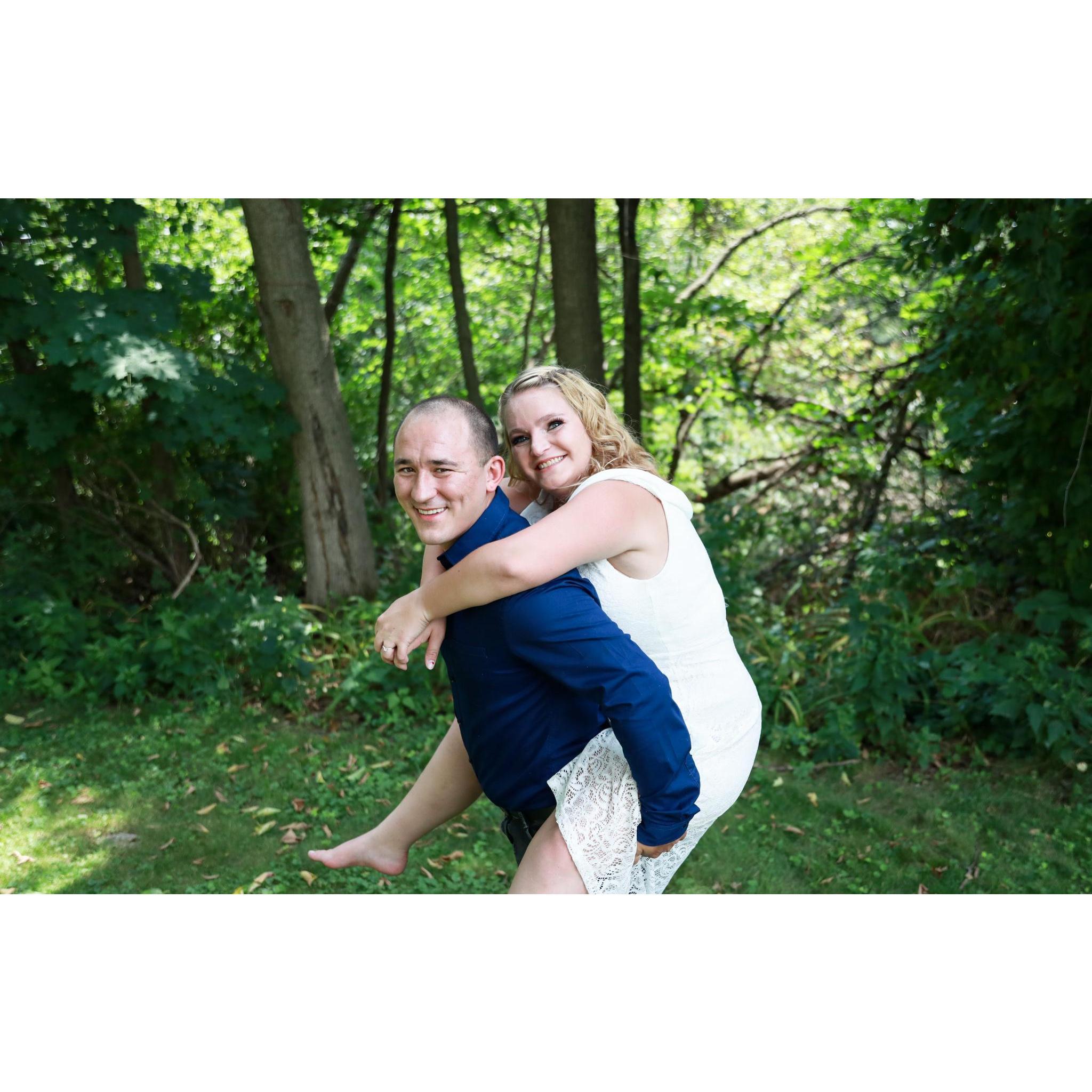 piggy back ride for engagement pictures