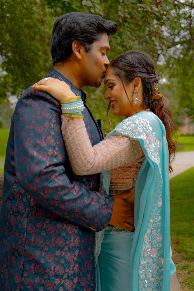 Krisha Regmi and Santhosh Ramini's Wedding Website