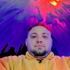 Picture of me with the icicles from above at the ice castles.