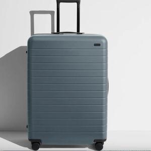 Shop Large & Checked Suitcases in Coast Blue | Away