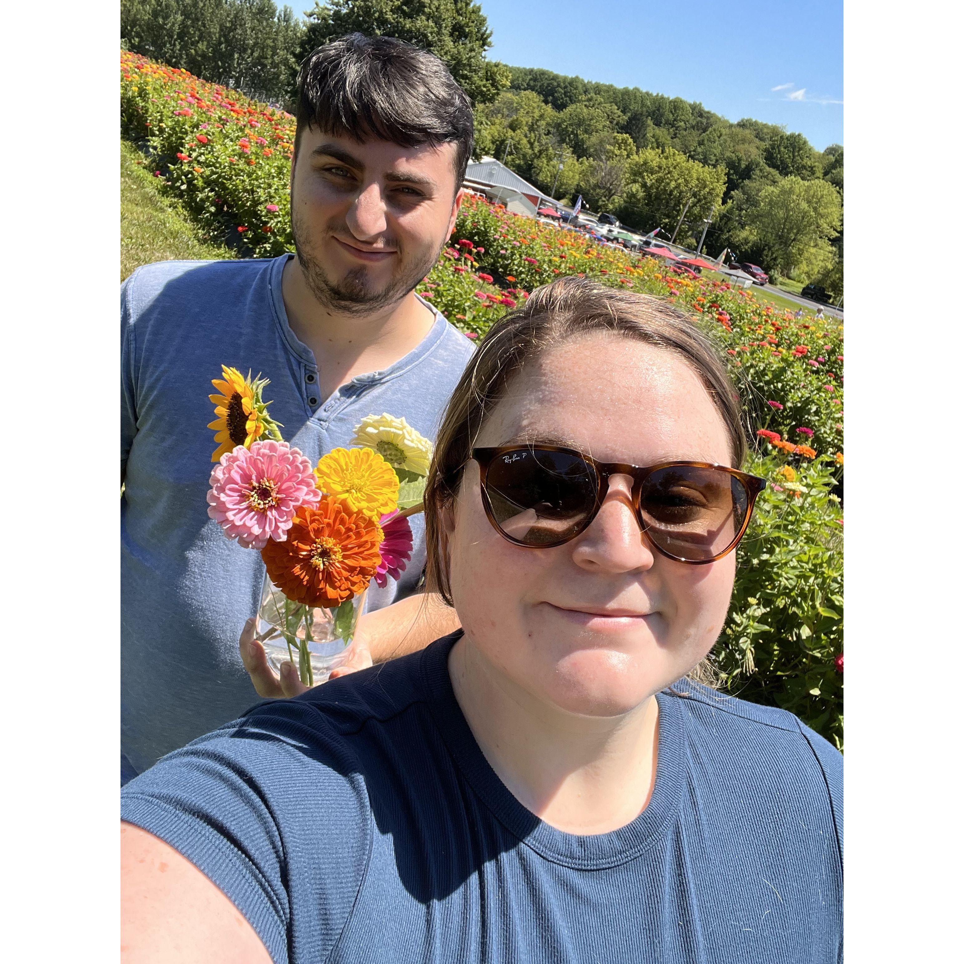 Dragging Spence along to flowers once again!