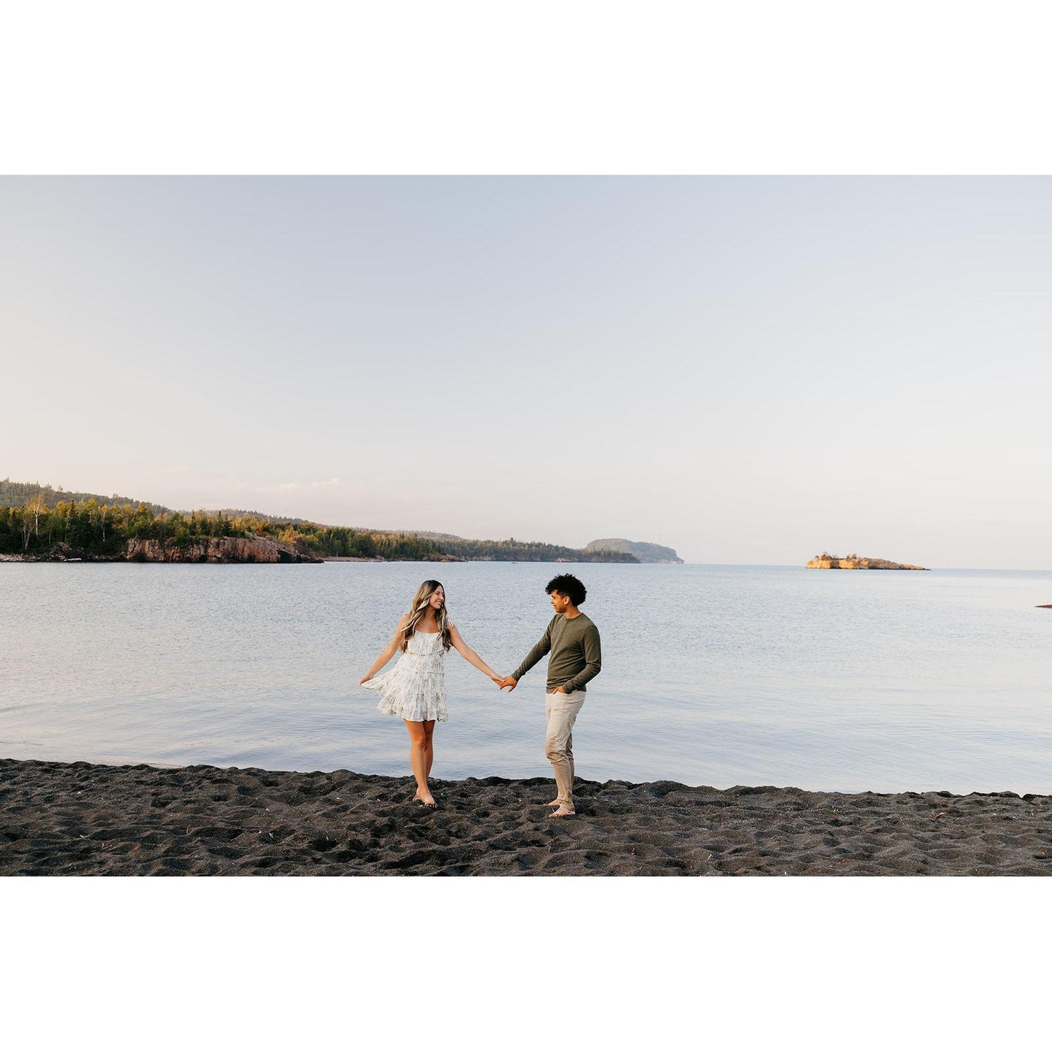 Engagement photo session at Black Beach, Silver Bay...