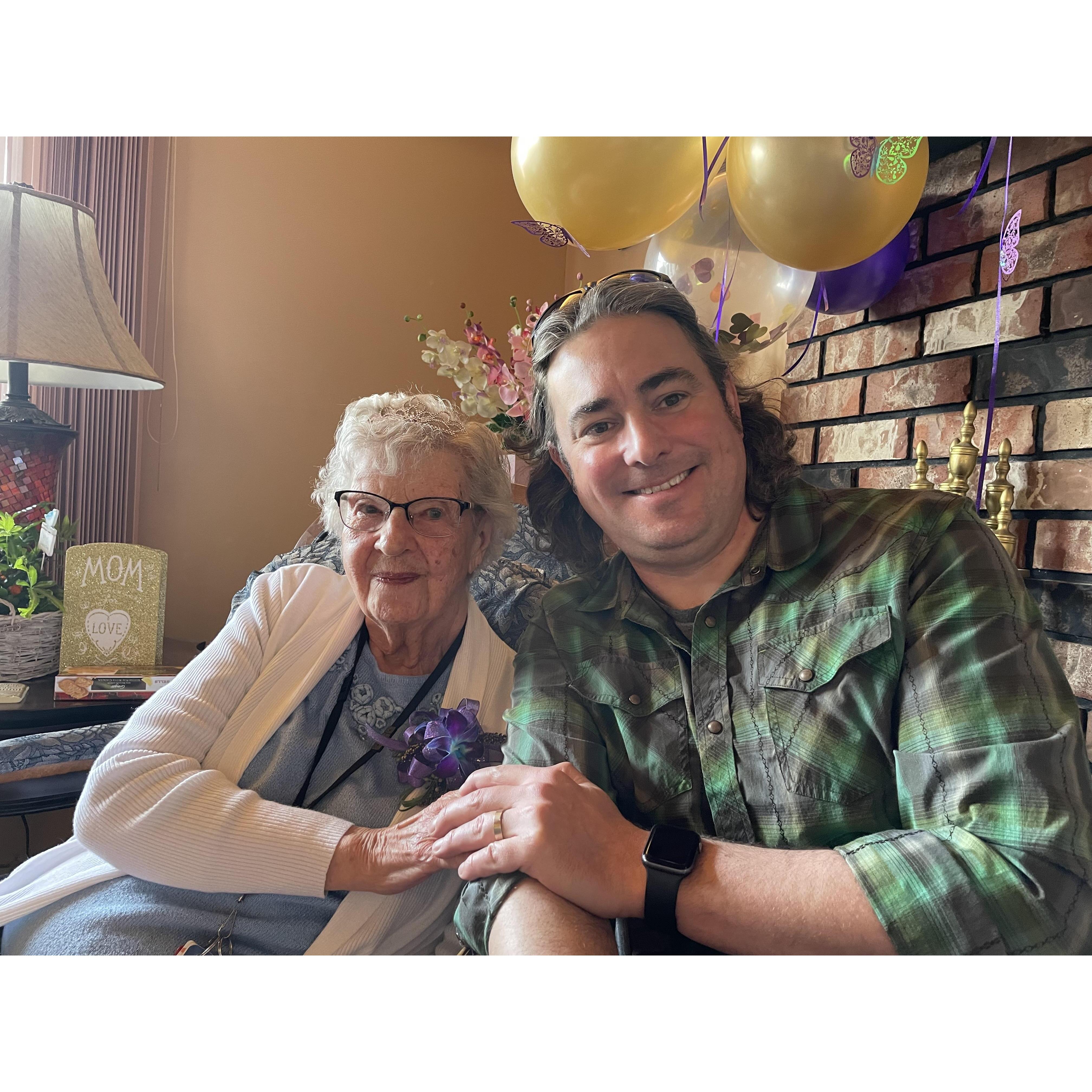 Foster and Grandma Joan at her 100th birthday in March 2022.