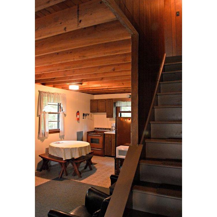 View of a cabin kitchen from the stairs