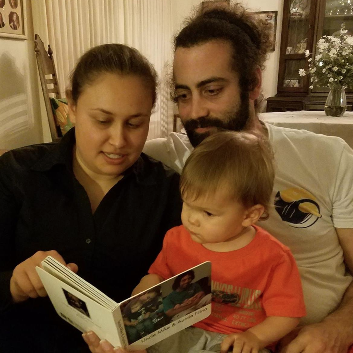 Reading to our nephew DJ Xmas 2017