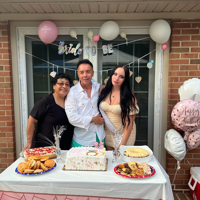 Izabella and her father and godmother ( who was best friends with her mother )on her engagement party !