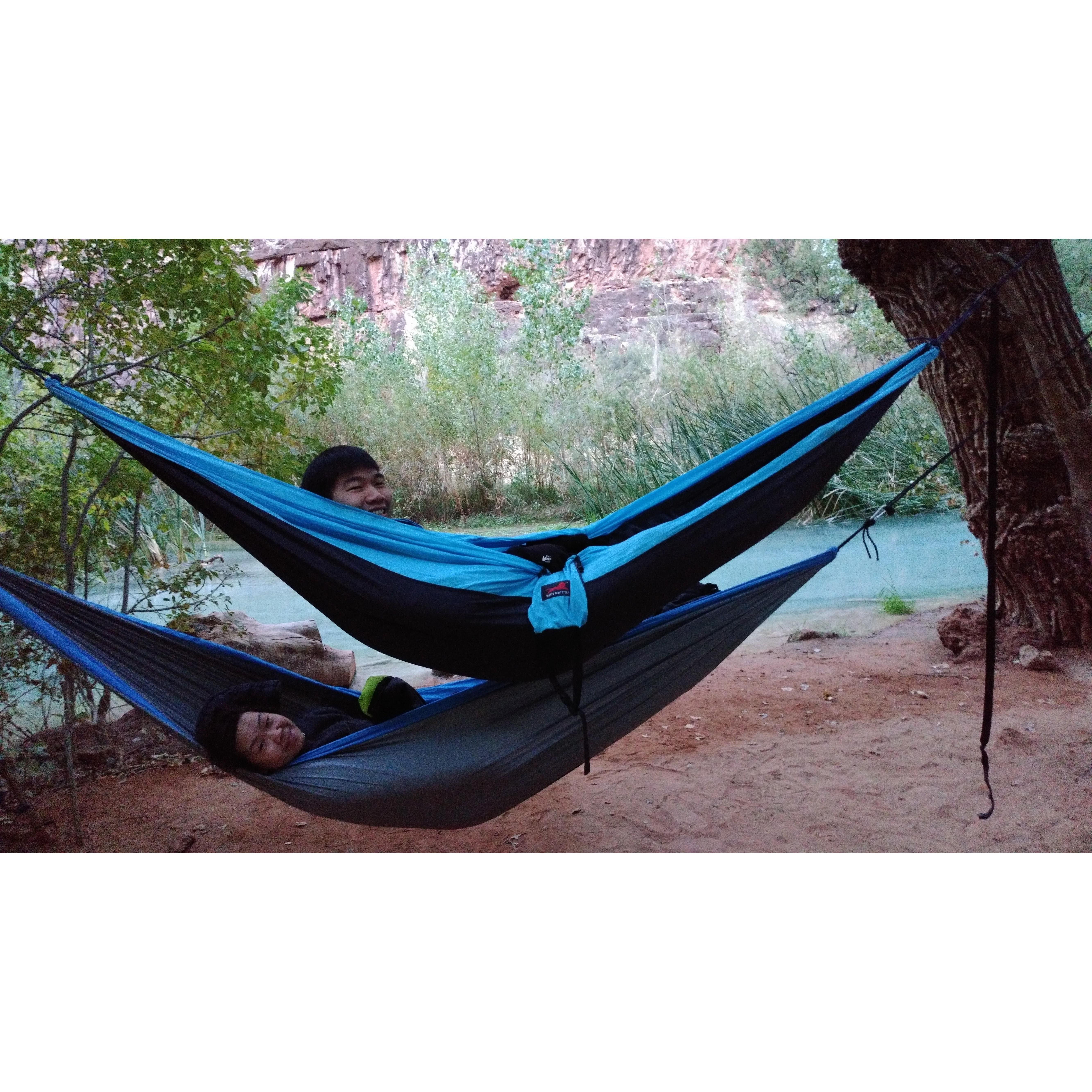 2 humans, 2 hammocks.