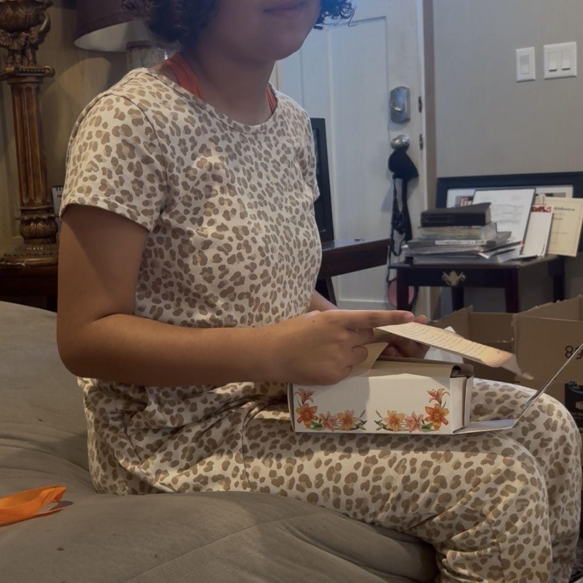 Braelyn accepting her box!