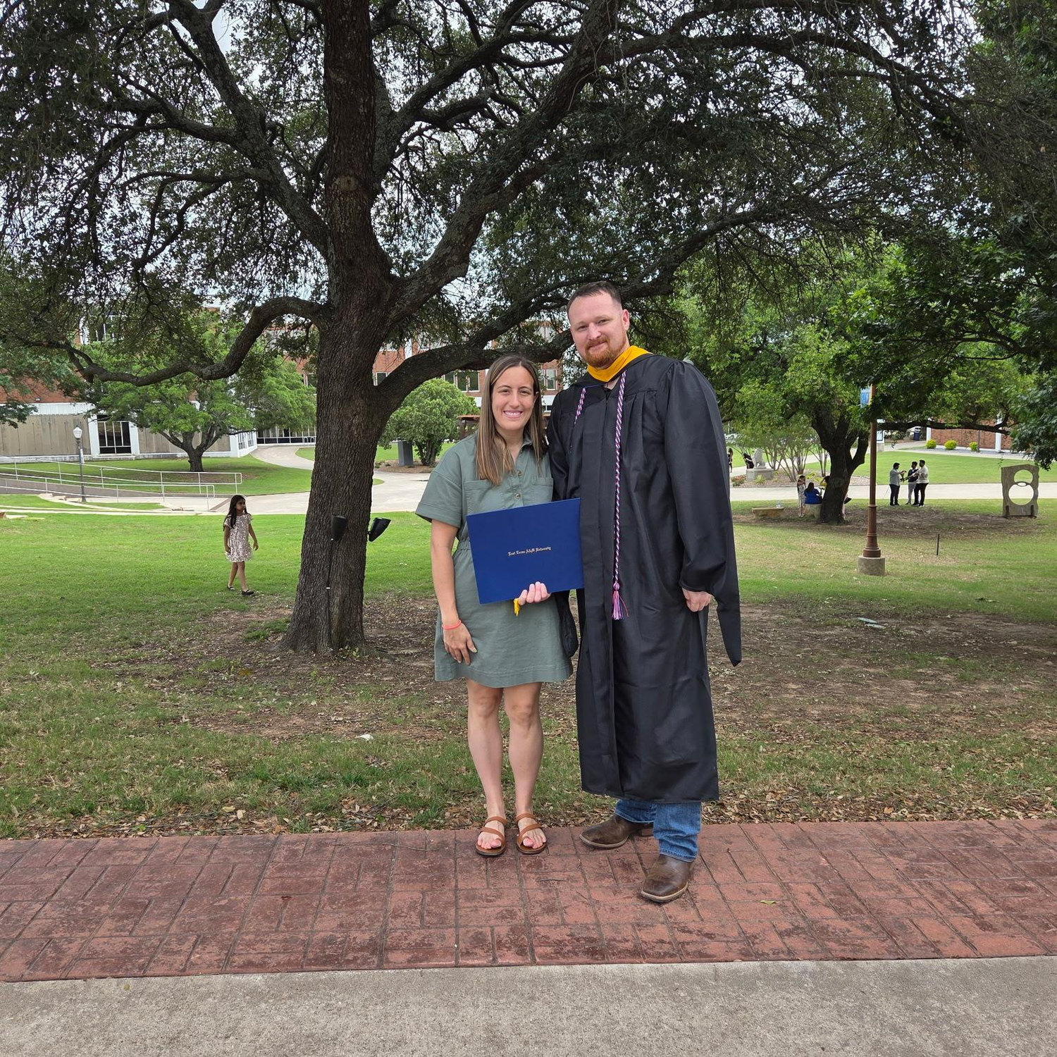 Graduation Day!! Newly earned Master's in Biology.