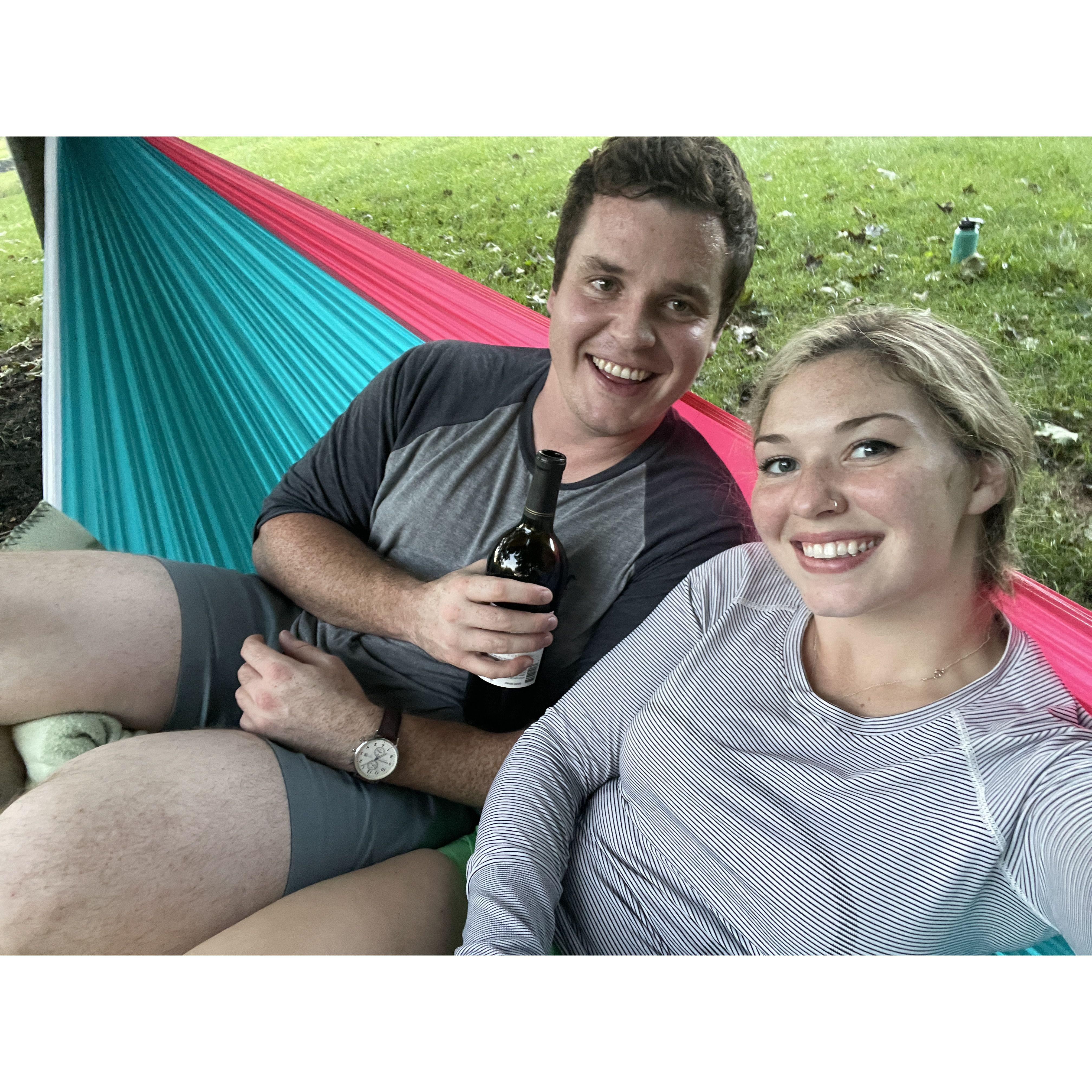 Drinking wine in the hammock