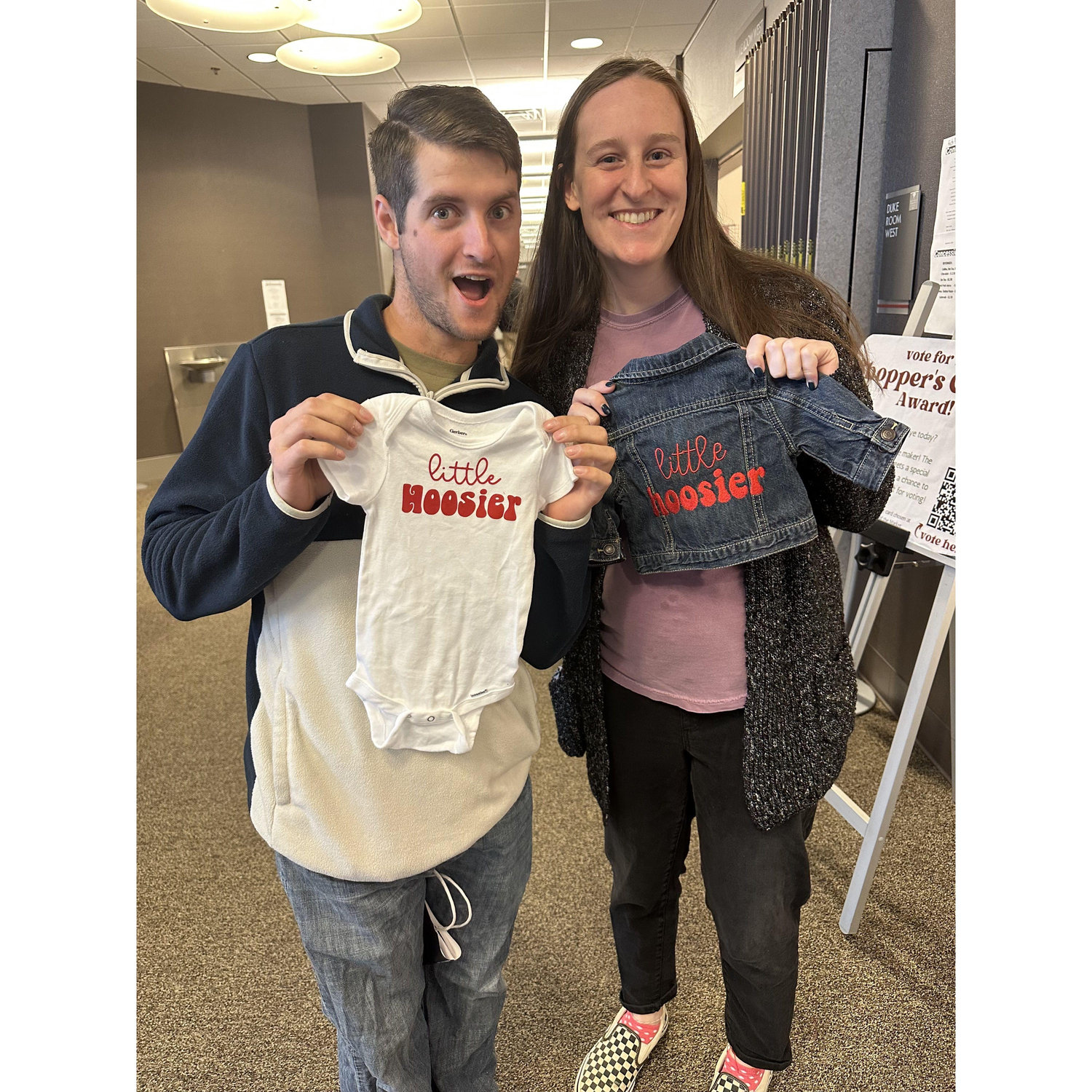 Shopping for baby clothes before the newcomer