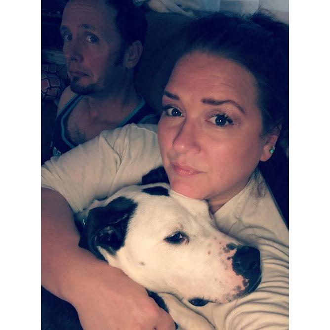 Chuck likes to make a face in the background of all my pix.