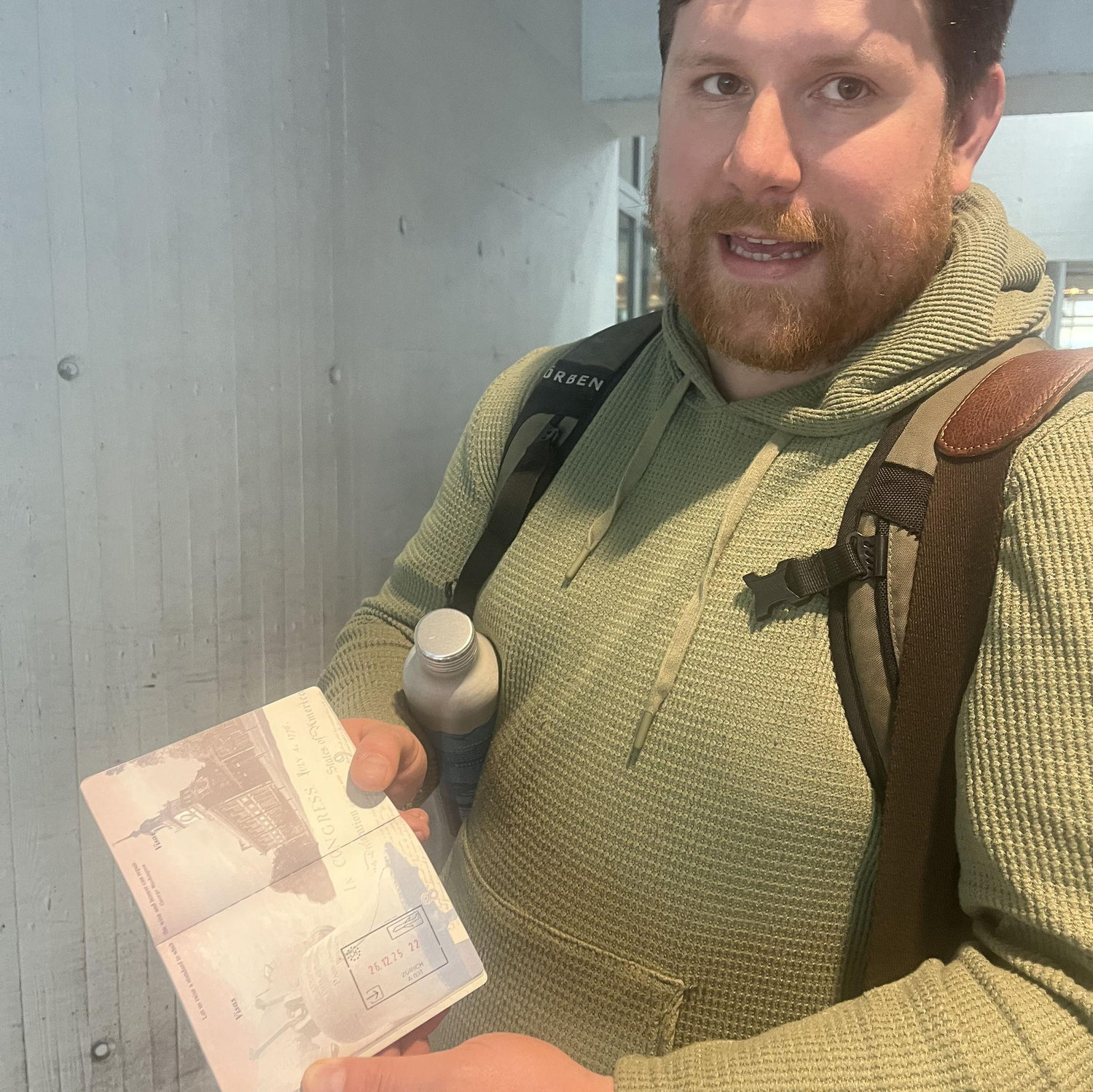 Evan's first stamp in his passport!