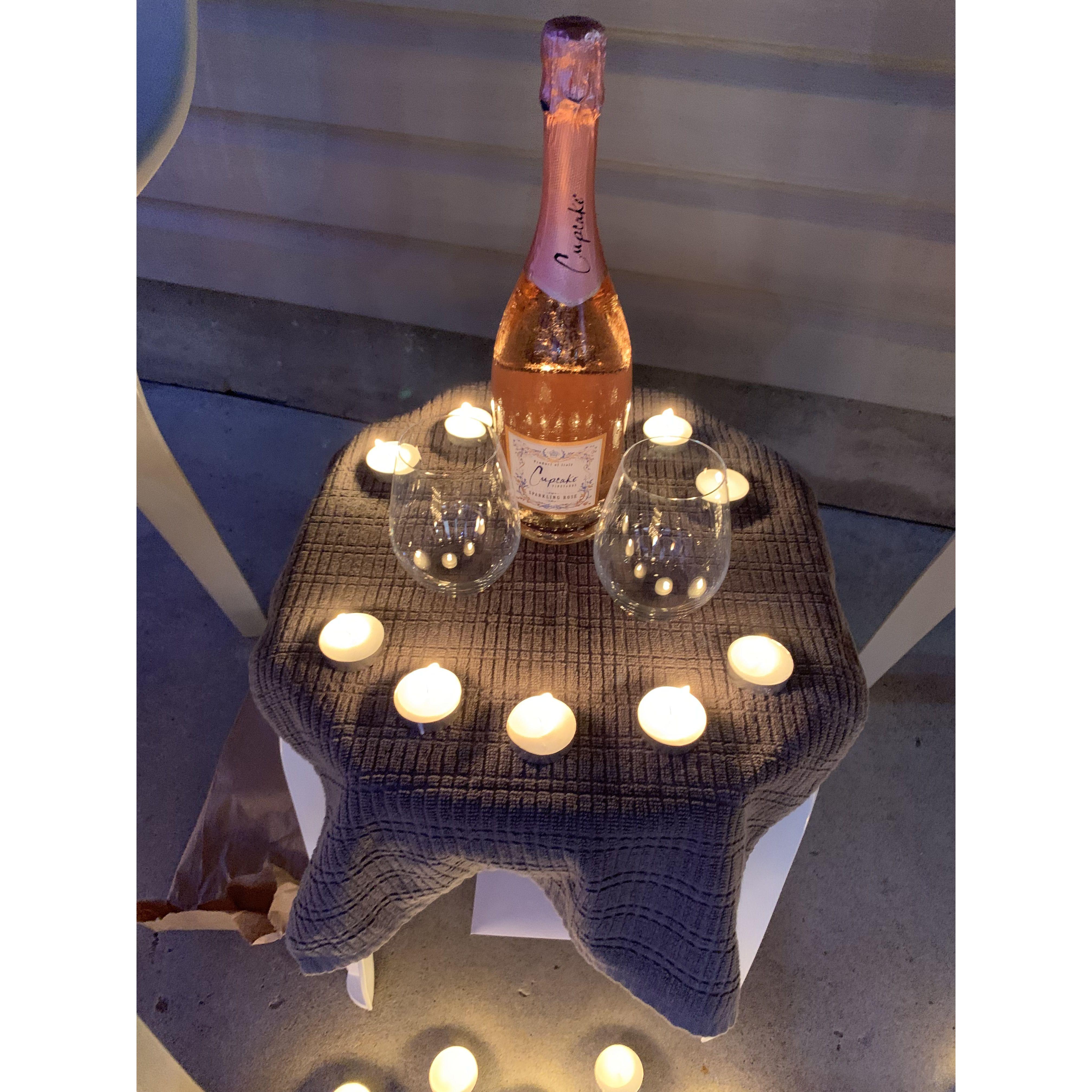 ...and champagne! (The rings are hidden under the table.)