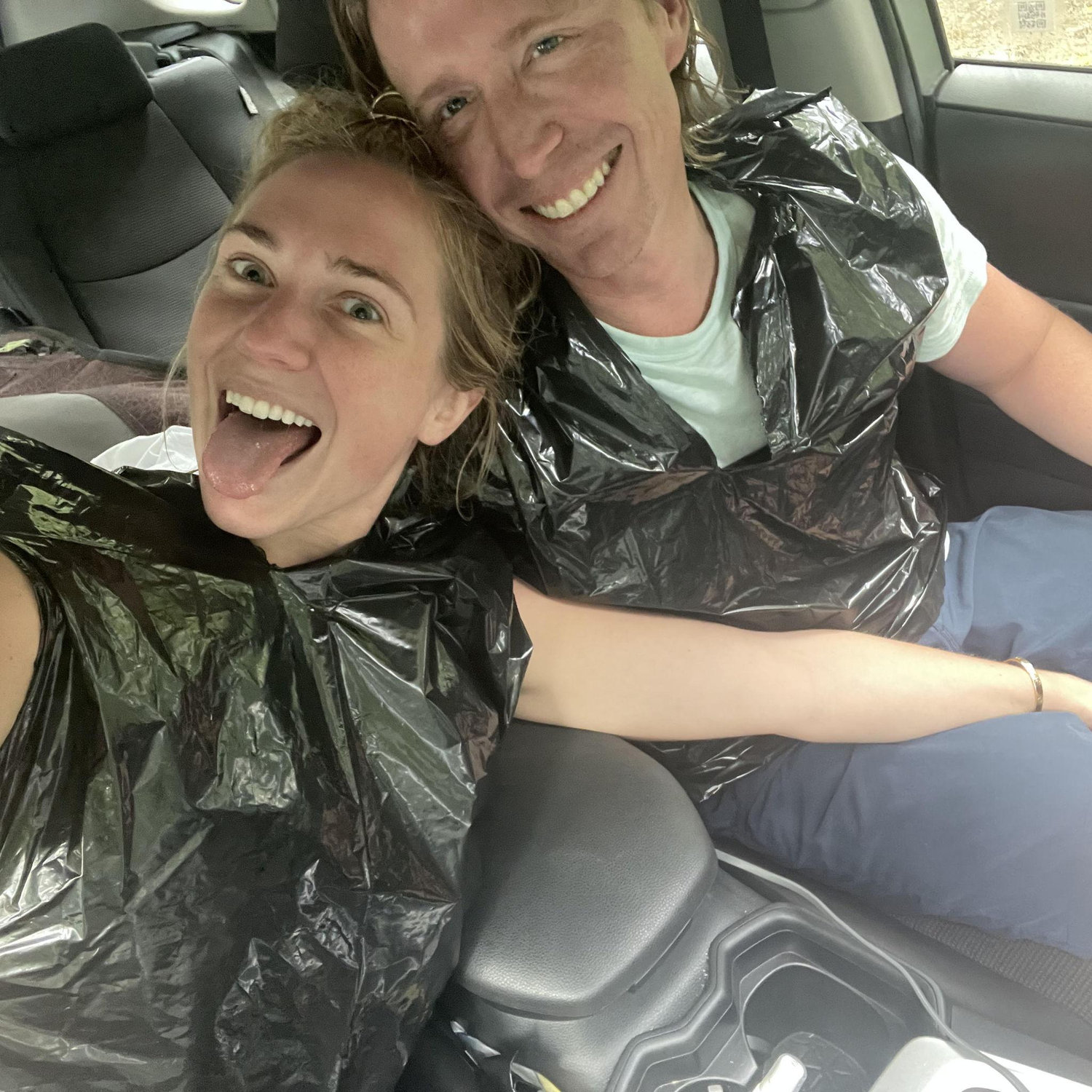 Wearing garbage bags to shield us from the Costa Rican rain!
