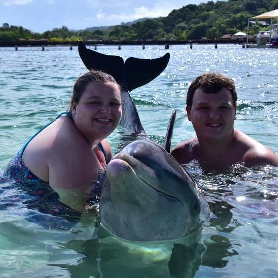 Our first cruise together. Meeting dolphins in Honduras was such an incredible adventure!