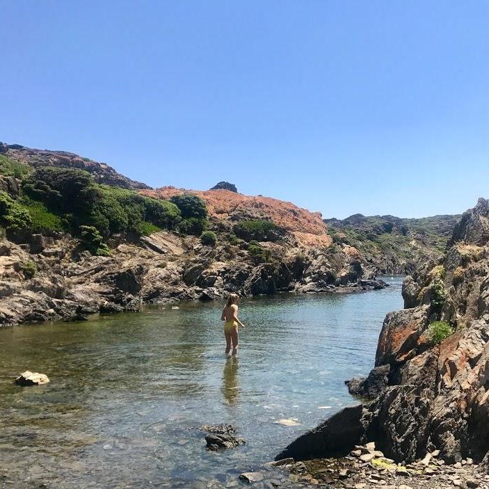 Erin exploring a cove at a natural park in Spain