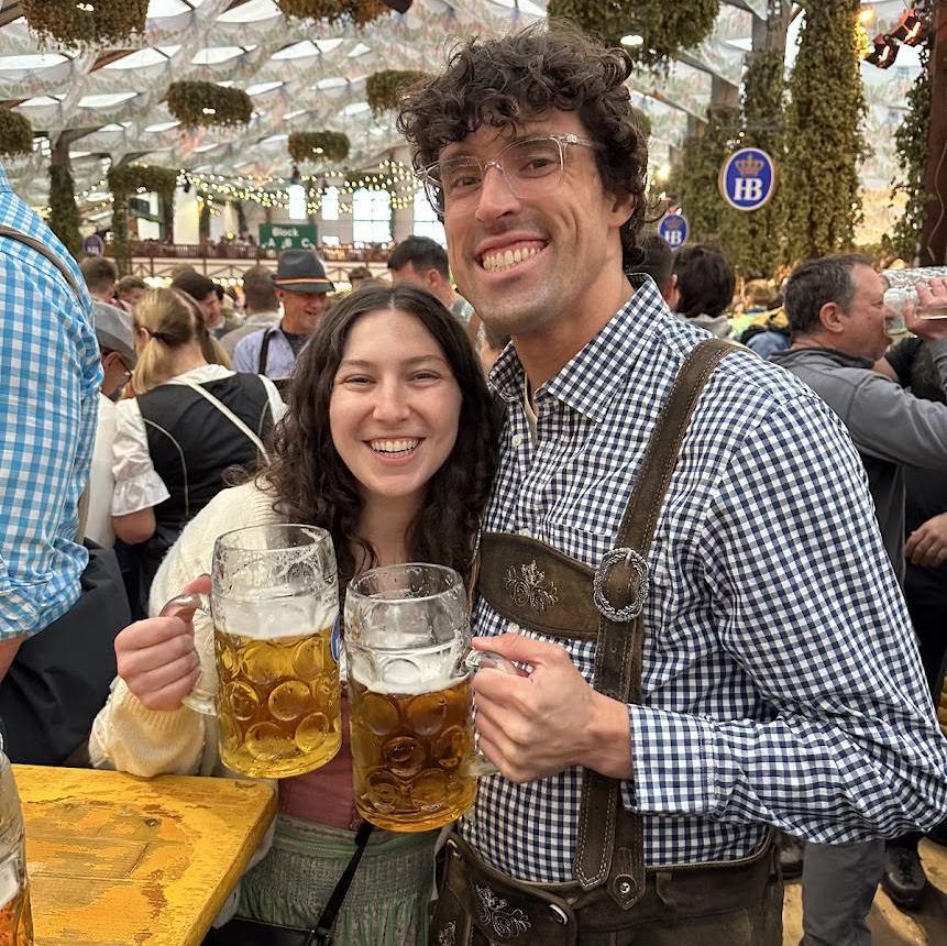 This is us at Oktoberfest in September 2025, testing out our wedding outfits (kidding) (maybe)