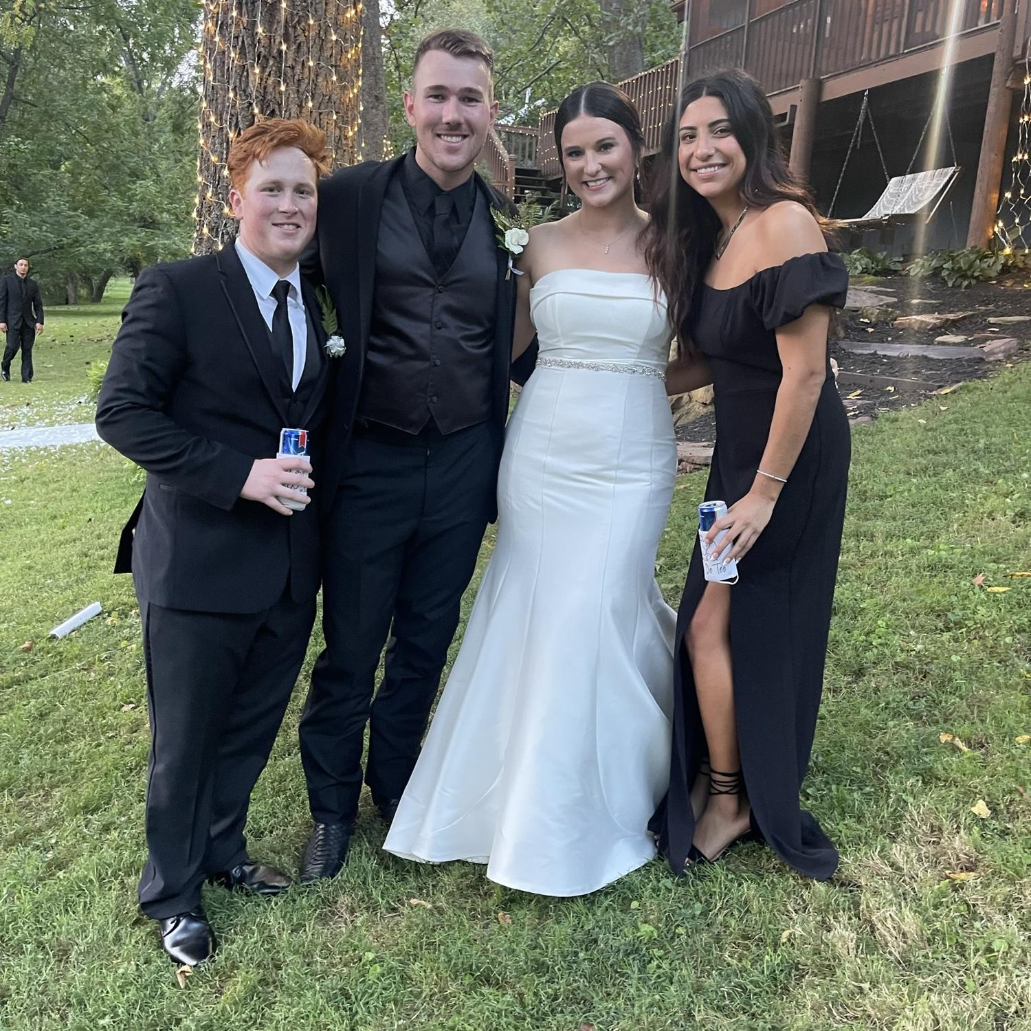 Us attending our wonderful friends wedding,  Warner and Clay!