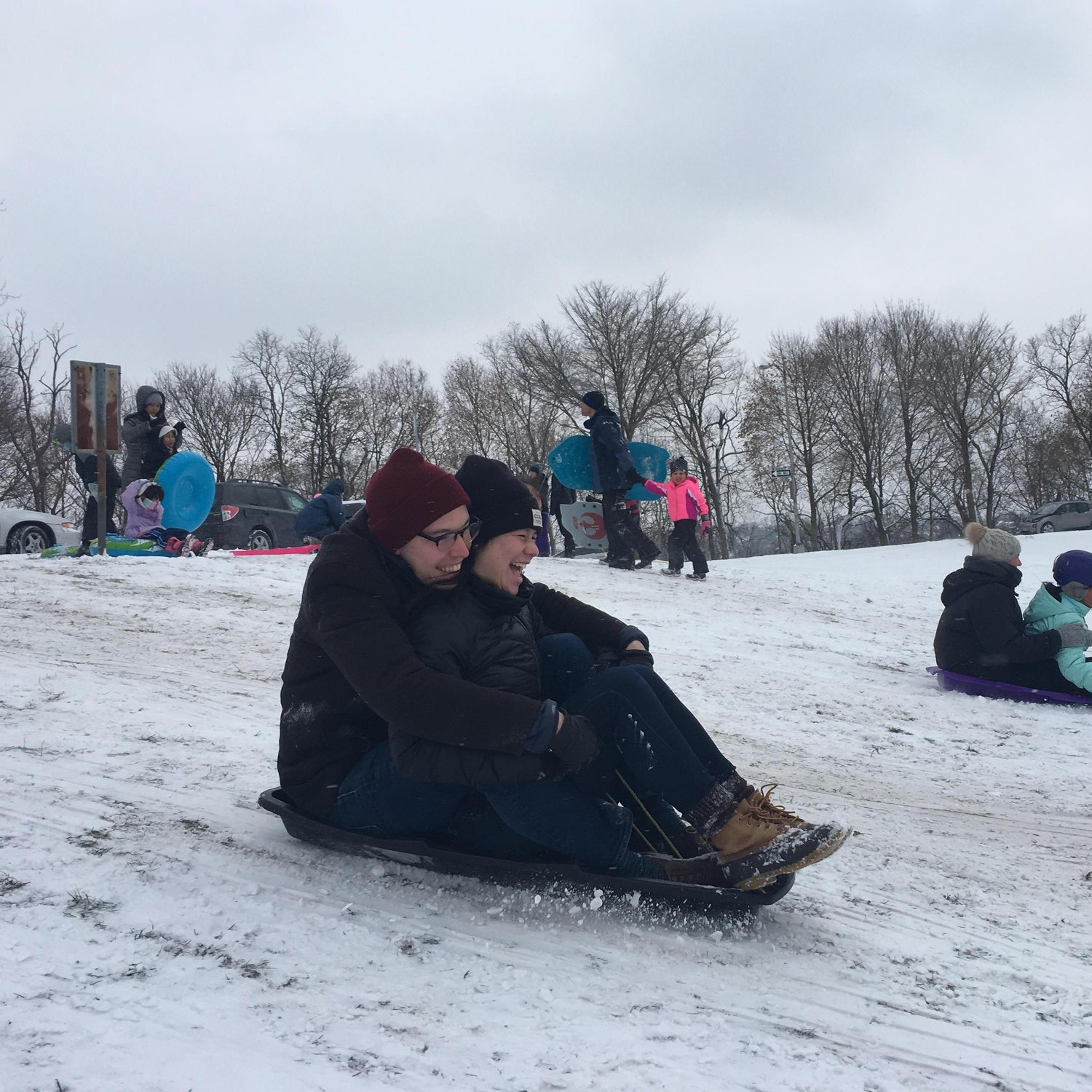 Over the course of their relationship, Chris has kept his eye on the weather for good sledding opportunities.