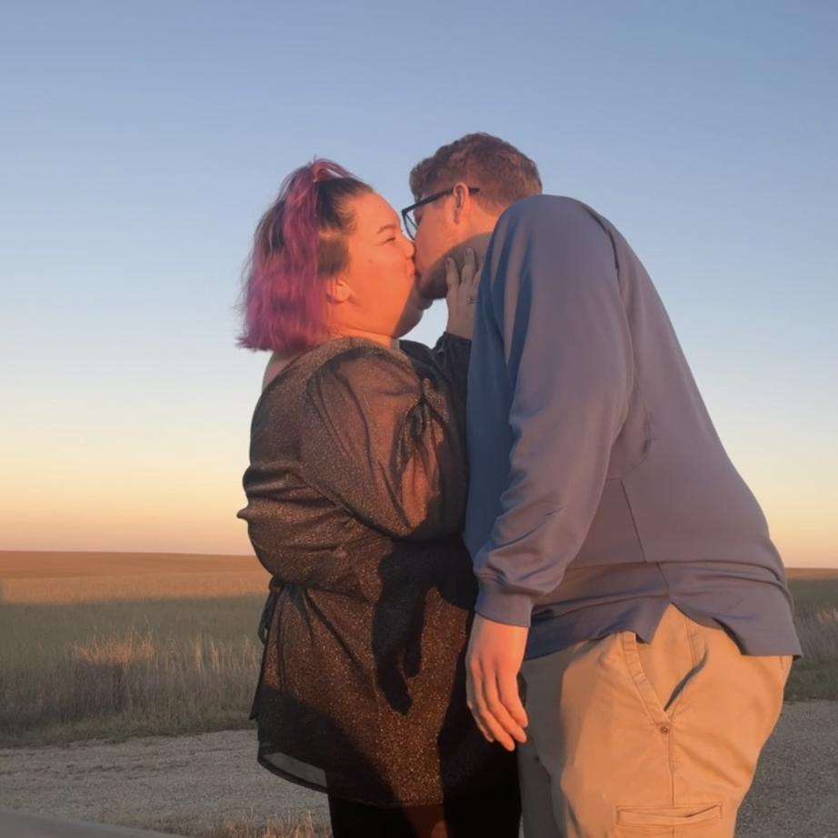 Golden hour kiss in the country