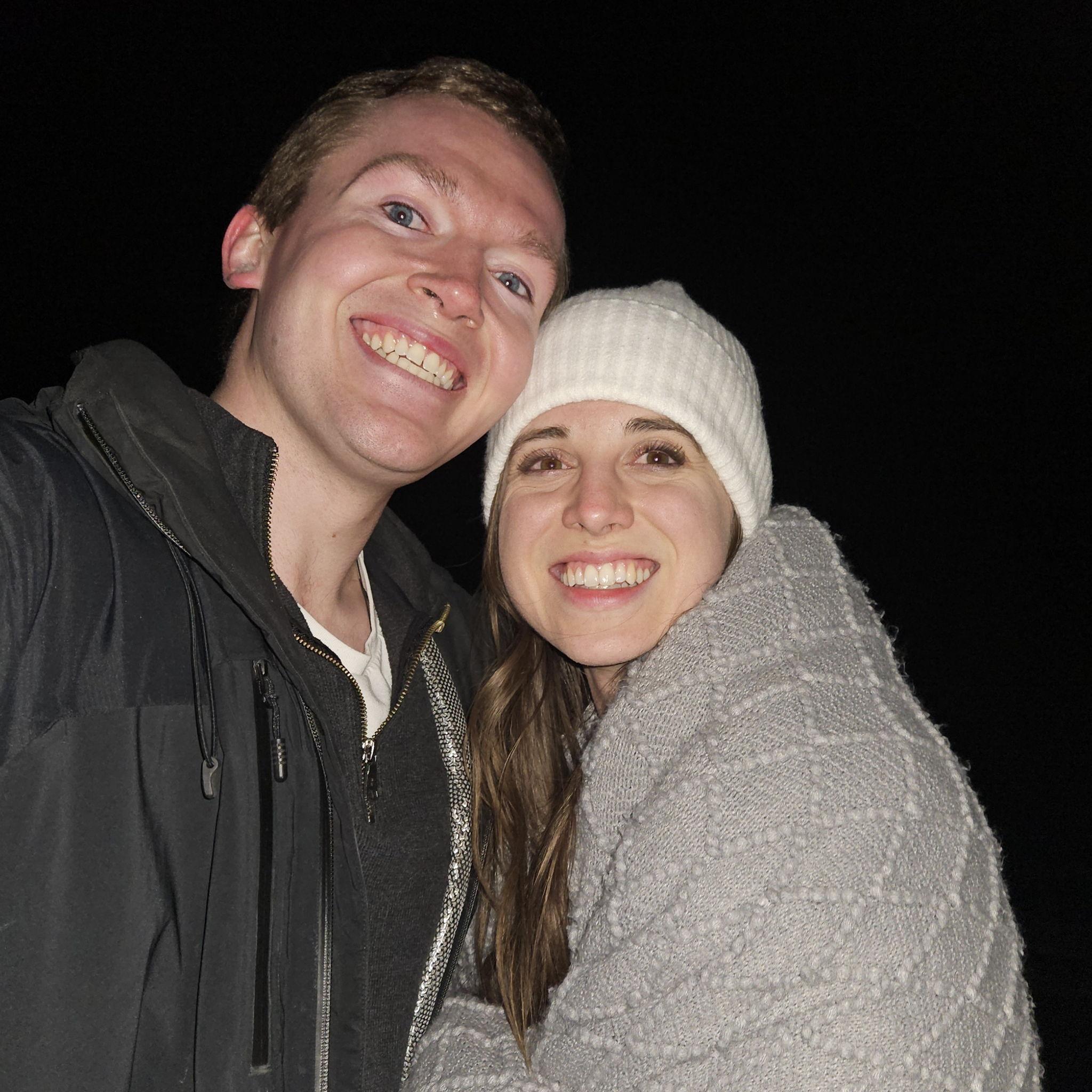 What people look like when they're both newly engaged and currently freezing to death